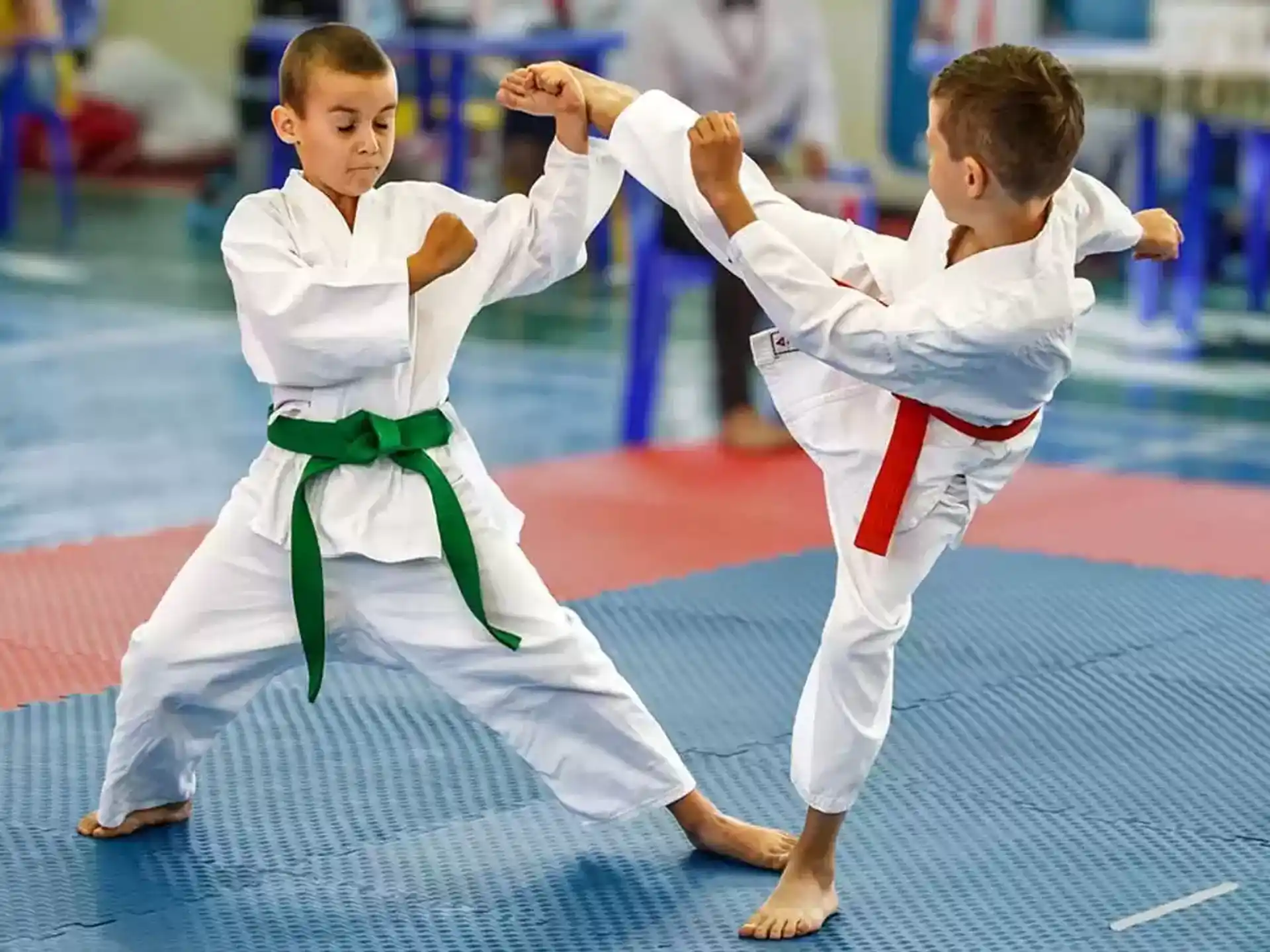 two boys in karate uniforms