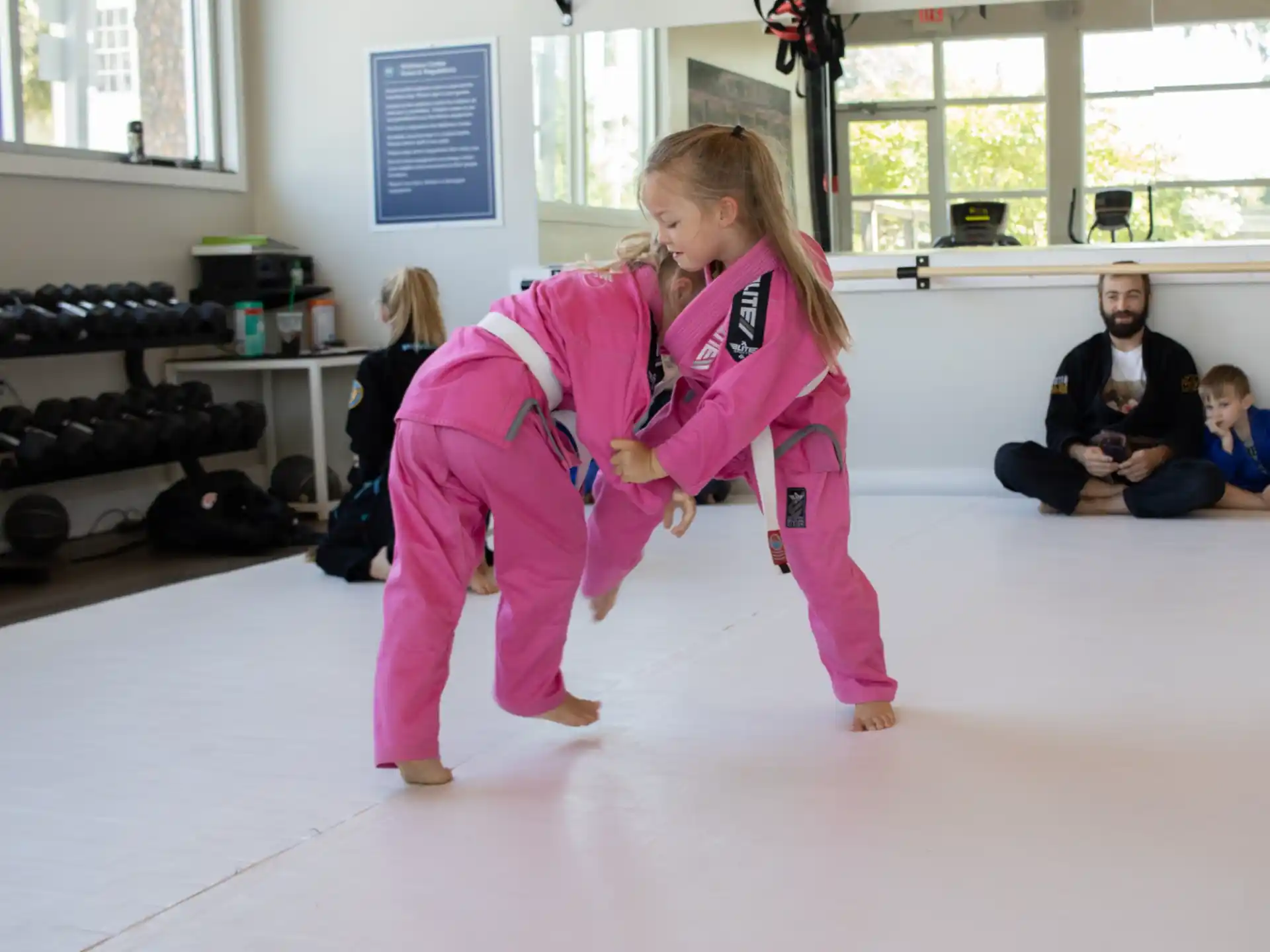 a girl in pink clothes