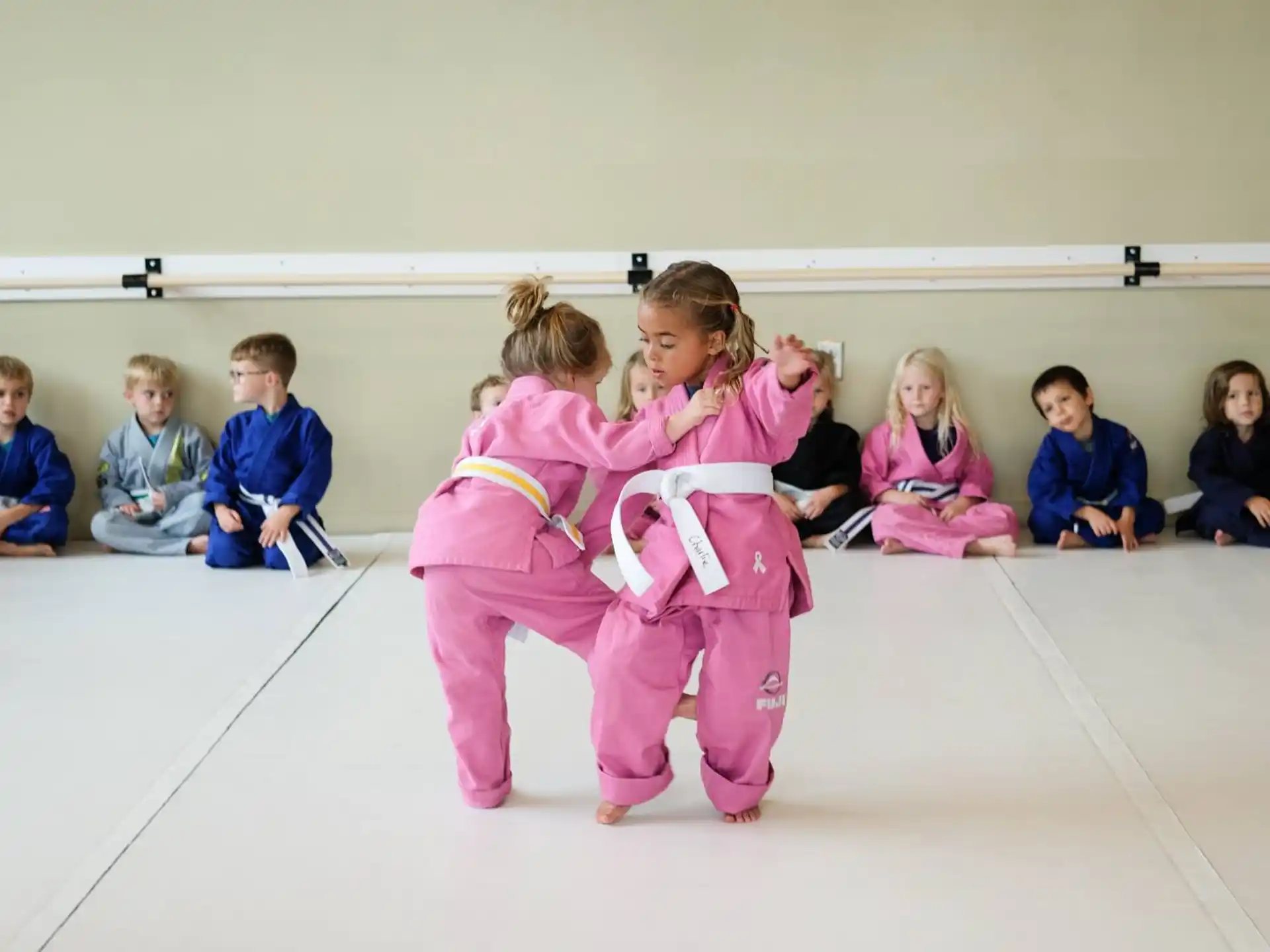 a group of children sitting on the floor