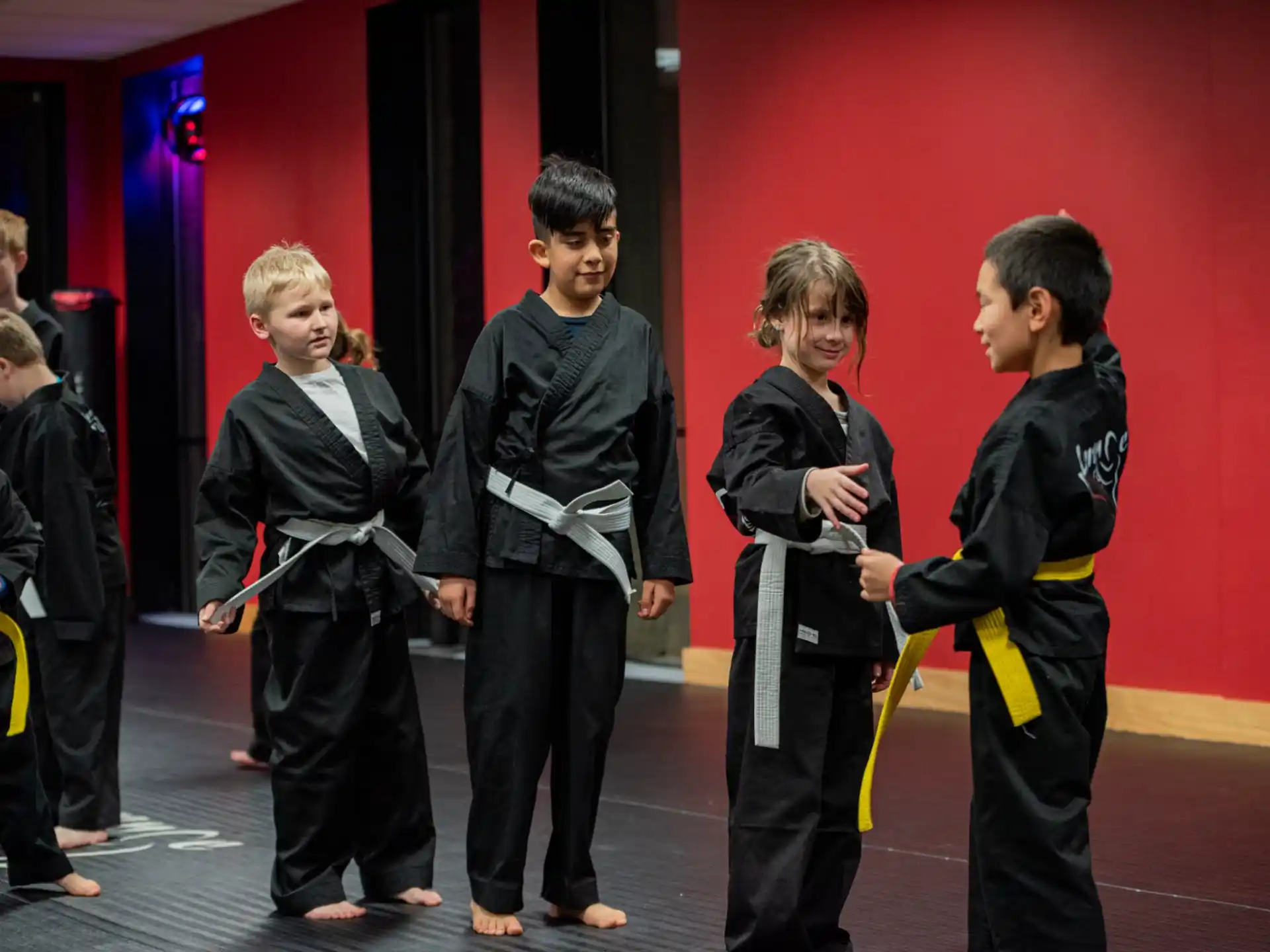 a group of people in black uniforms
