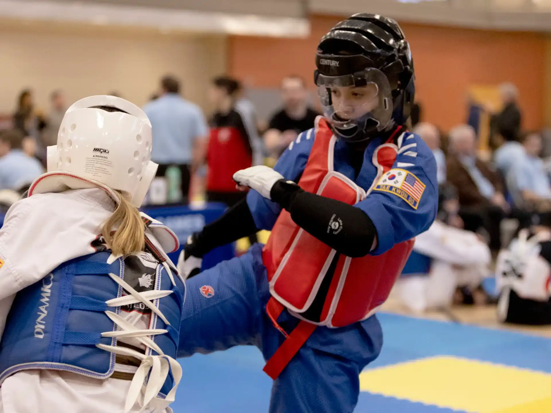 a couple of people wearing helmets and holding each other