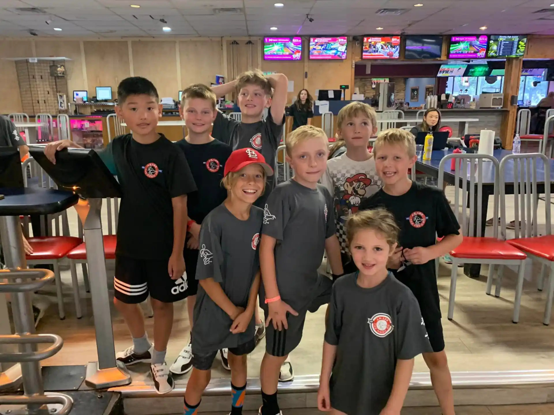 a group of boys posing for a picture
