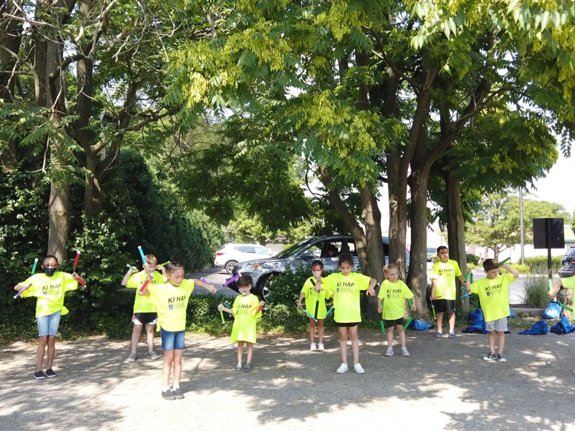 a group of people in yellow shirts