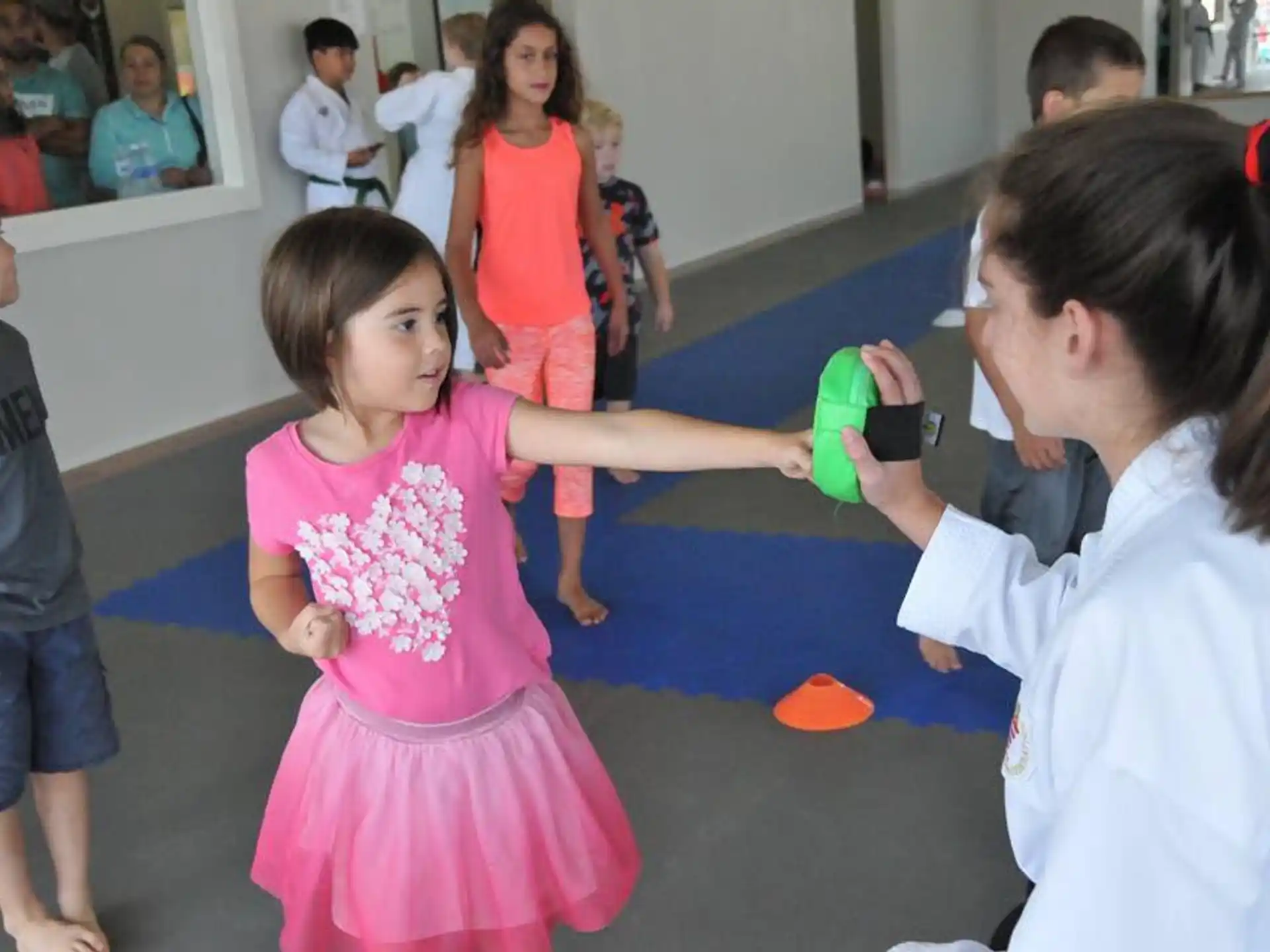 a group of children playing with a toy