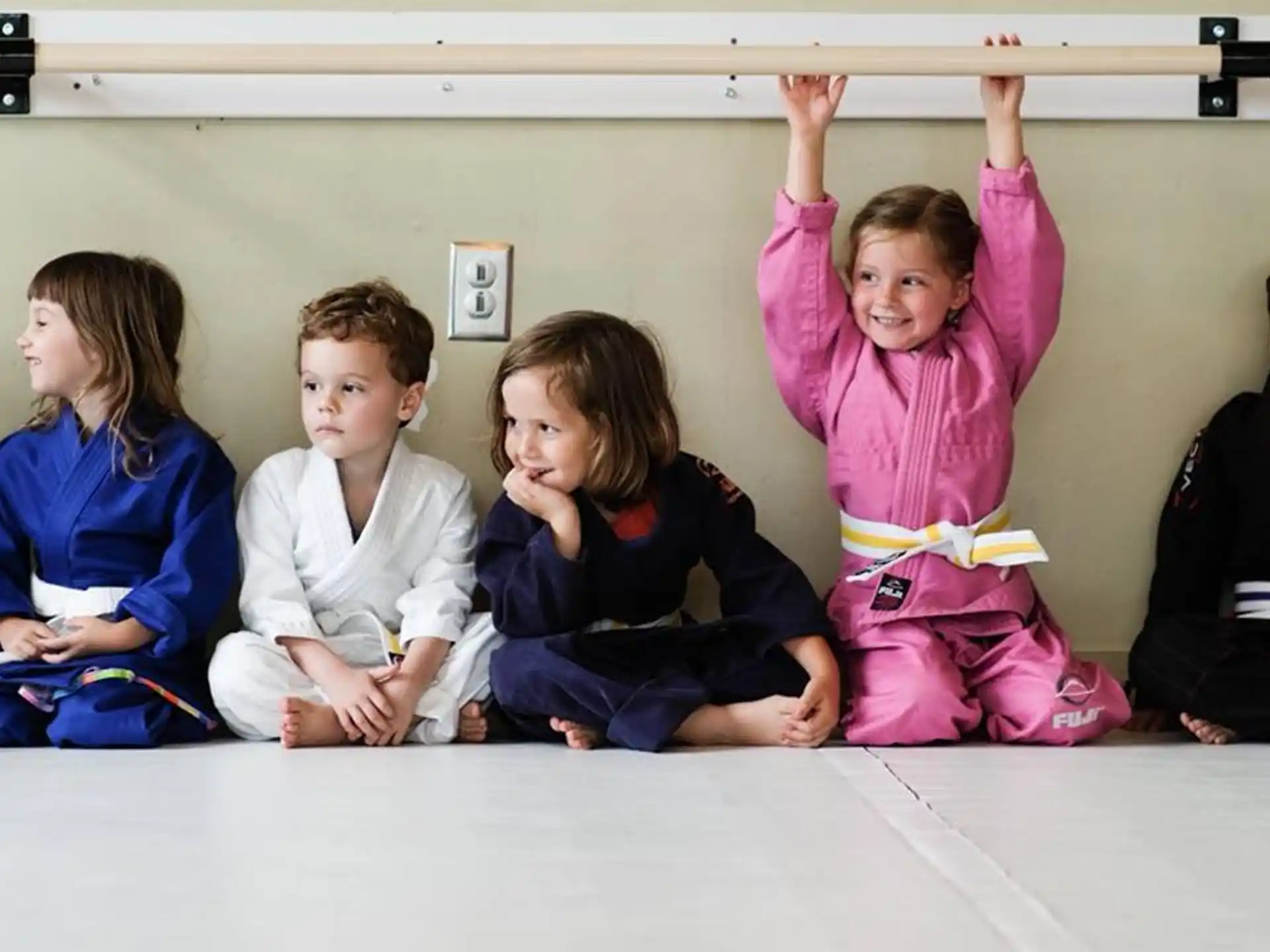 a group of children sitting on the floor