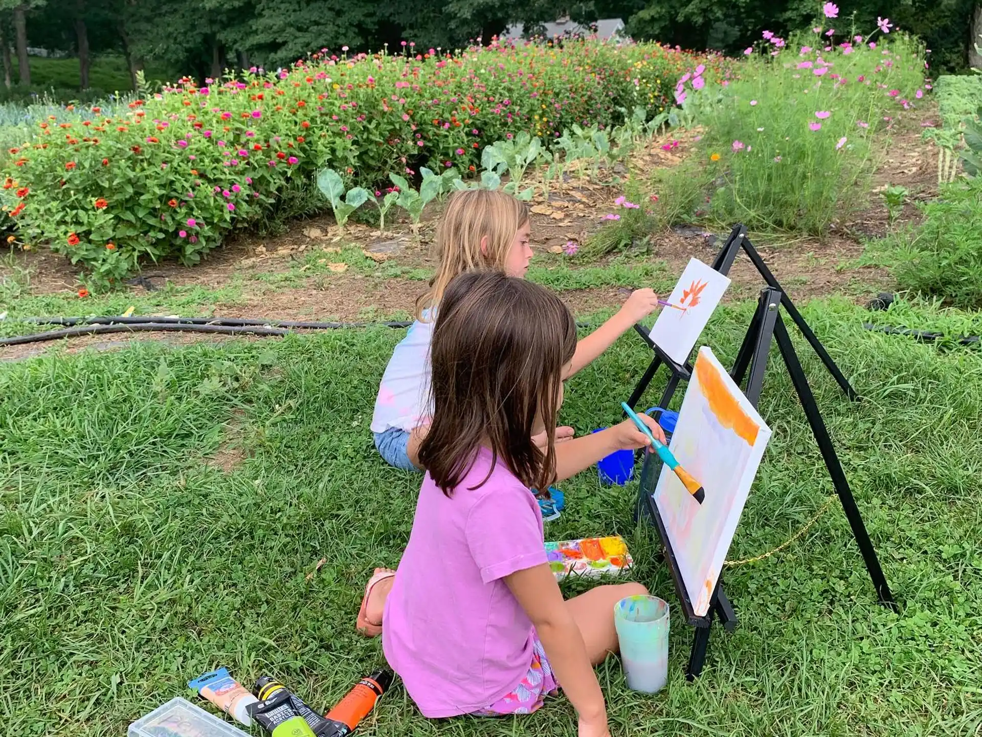 a couple of girls painting