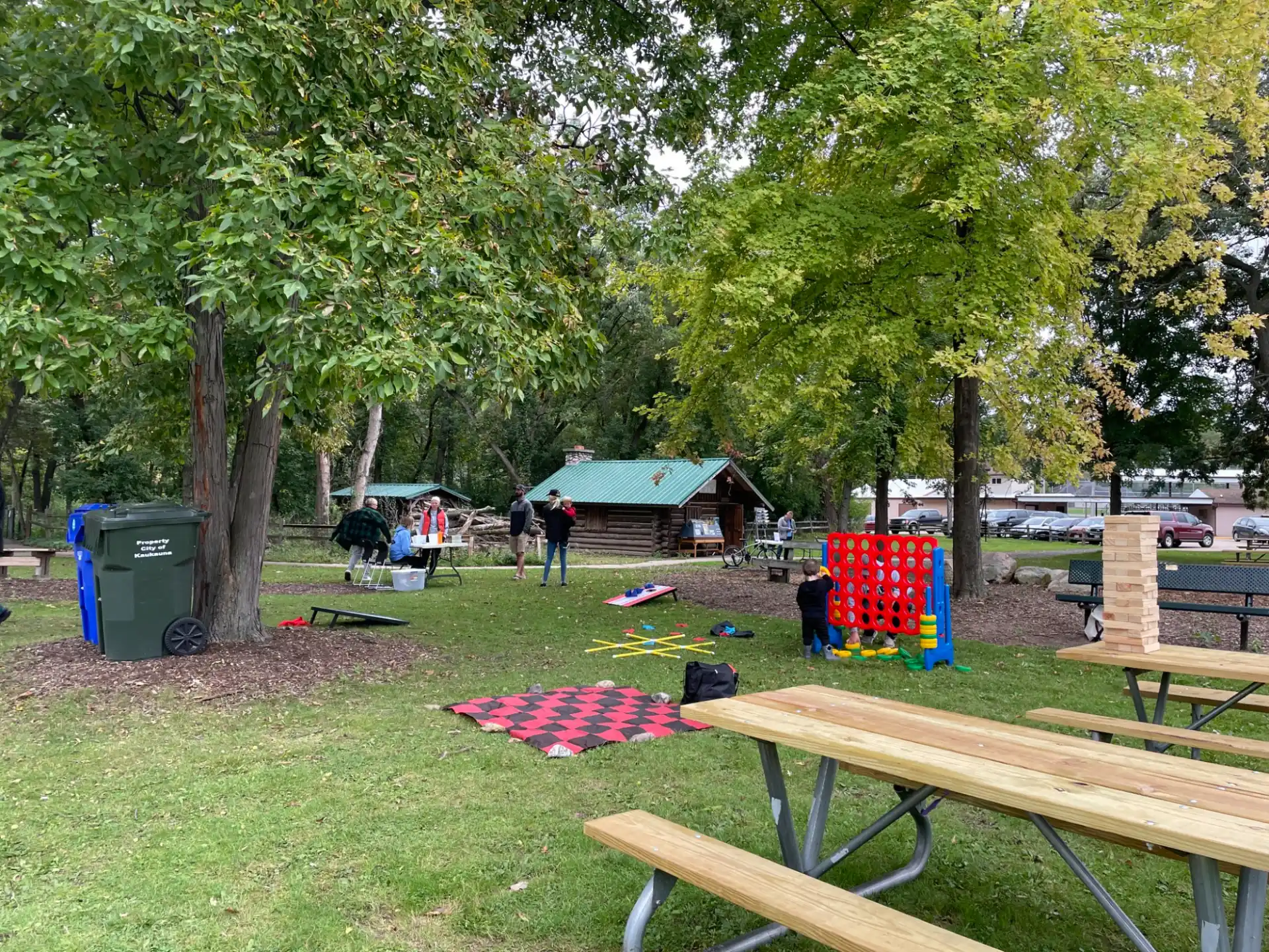 a group of people playing in a park