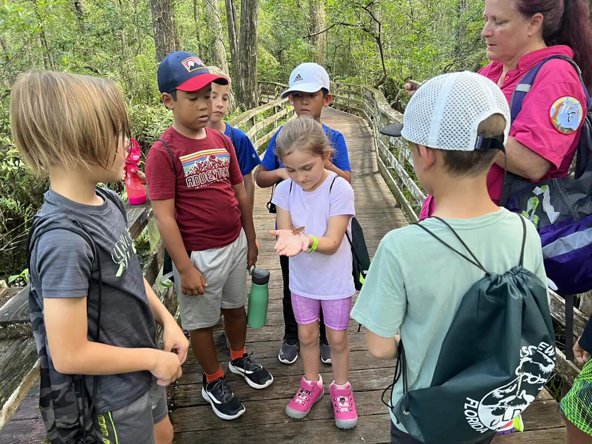a group of children standing outside