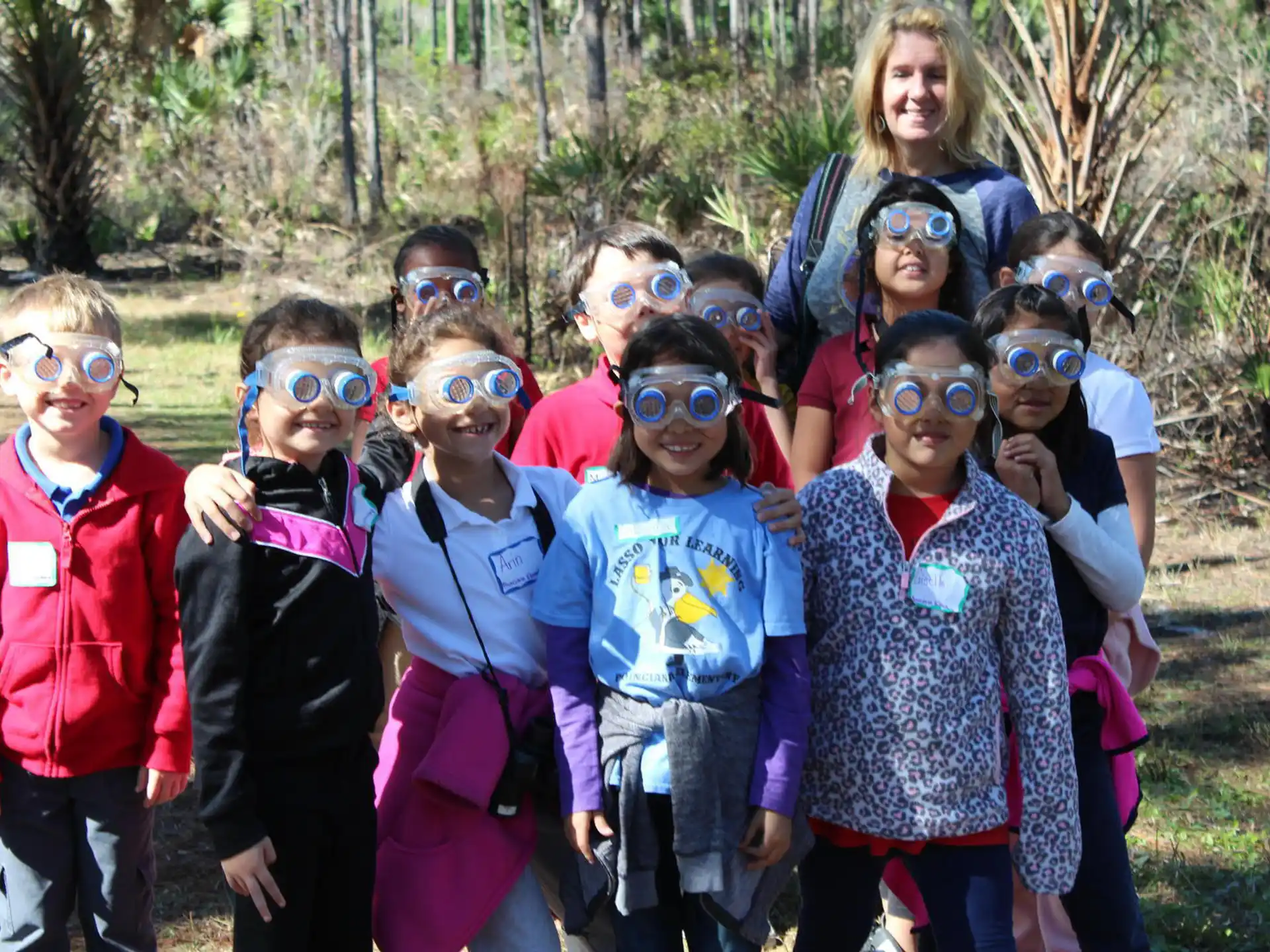 a group of children wearing goggles