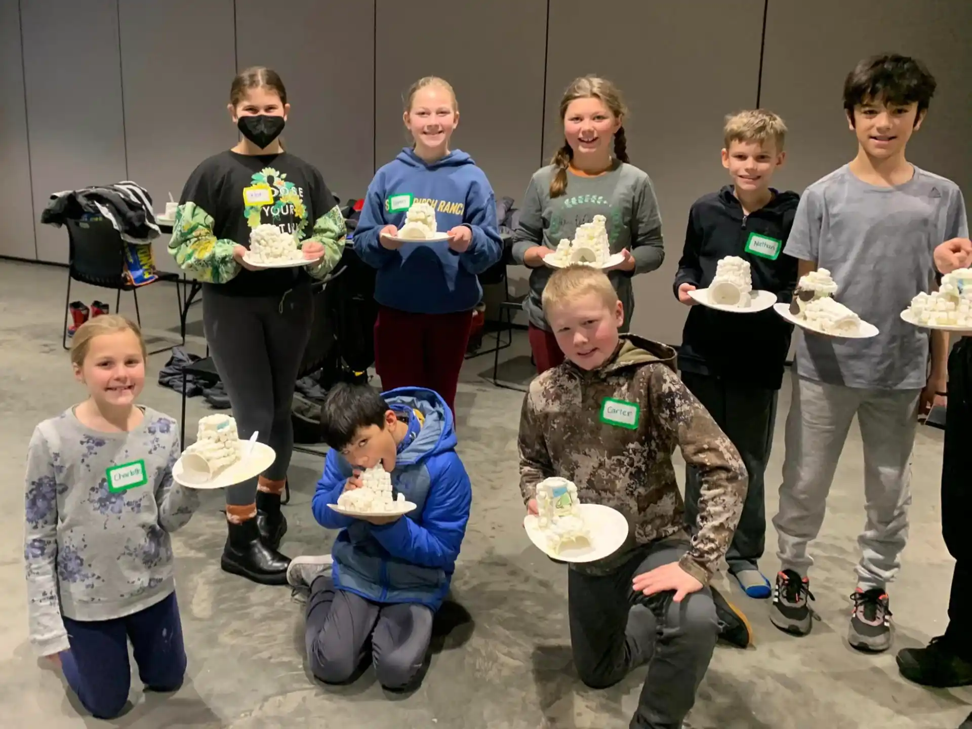 a group of people holding food