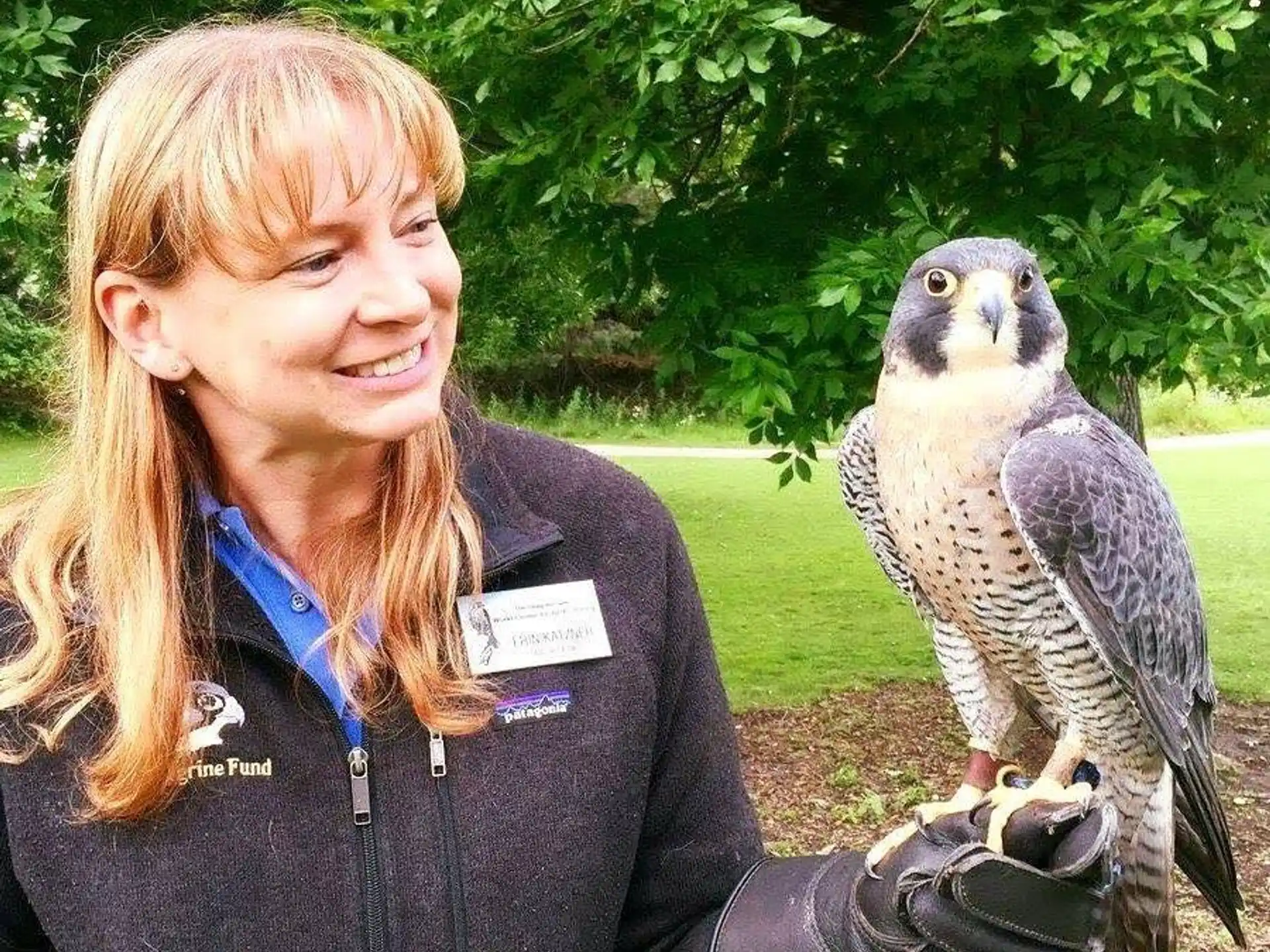 a person holding a bird