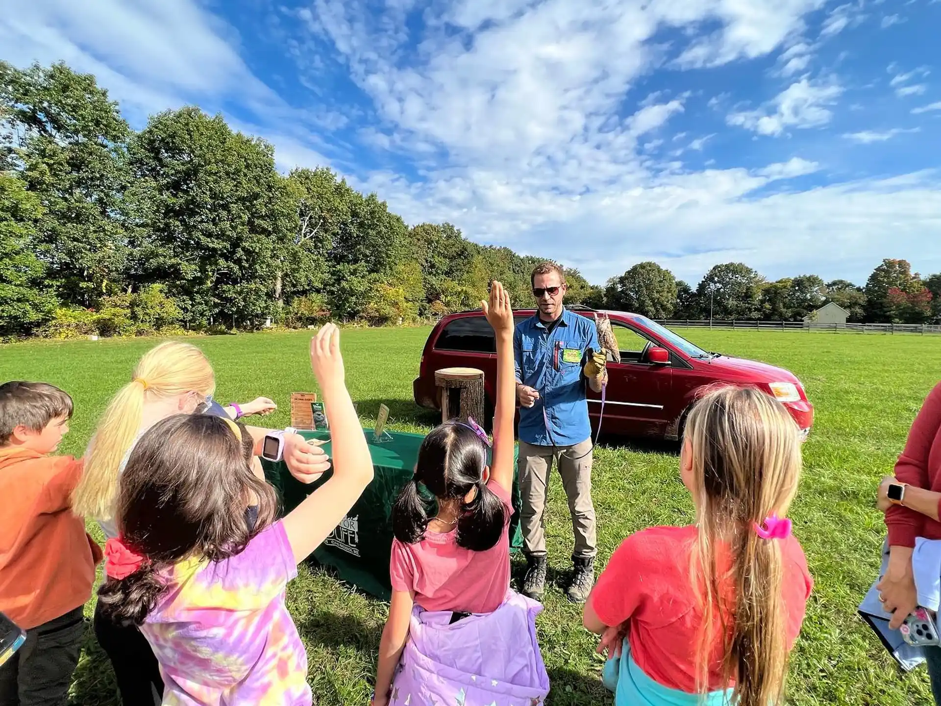 a man standing in front of a group of people
