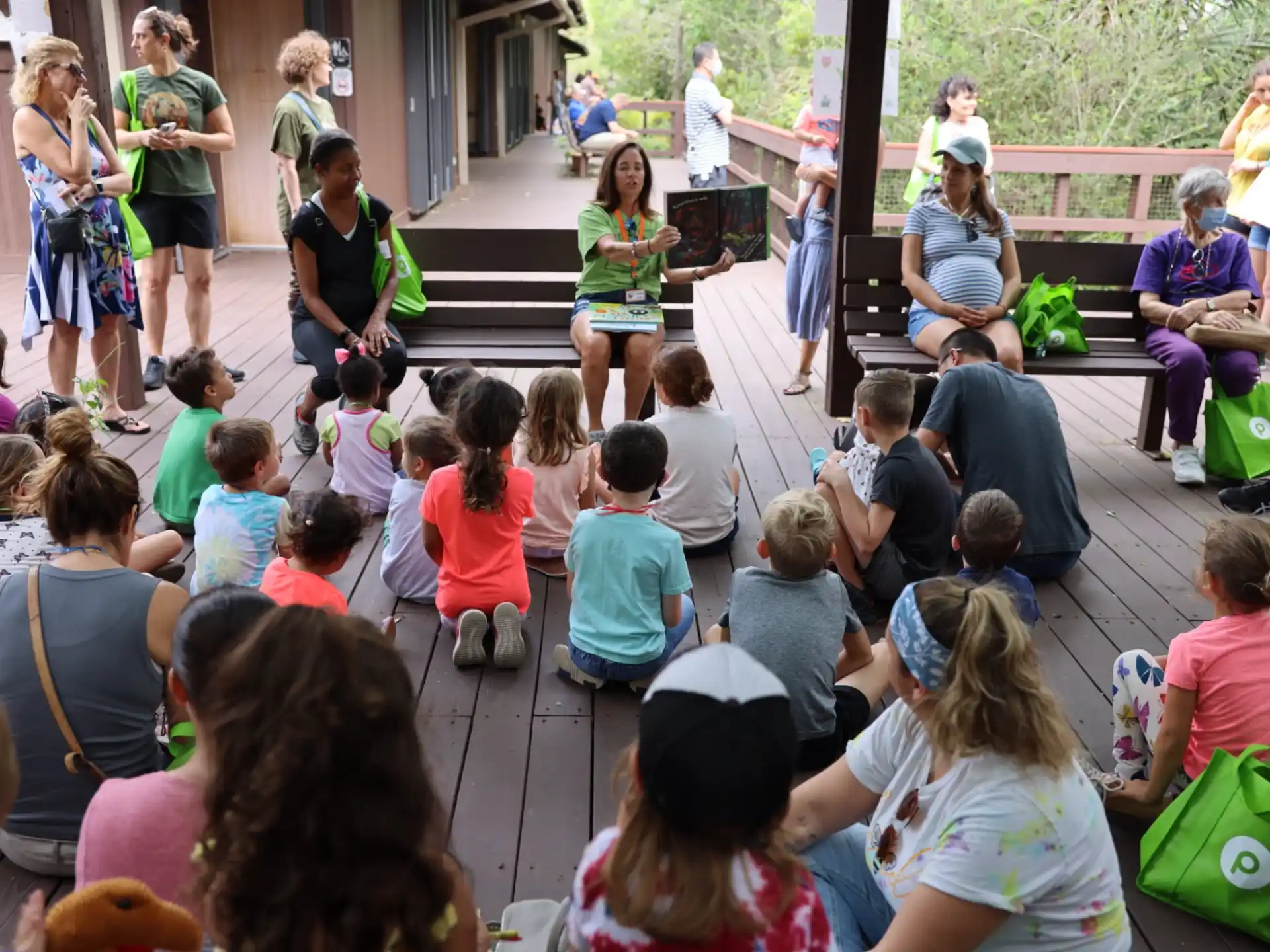 a group of people sitting on the ground