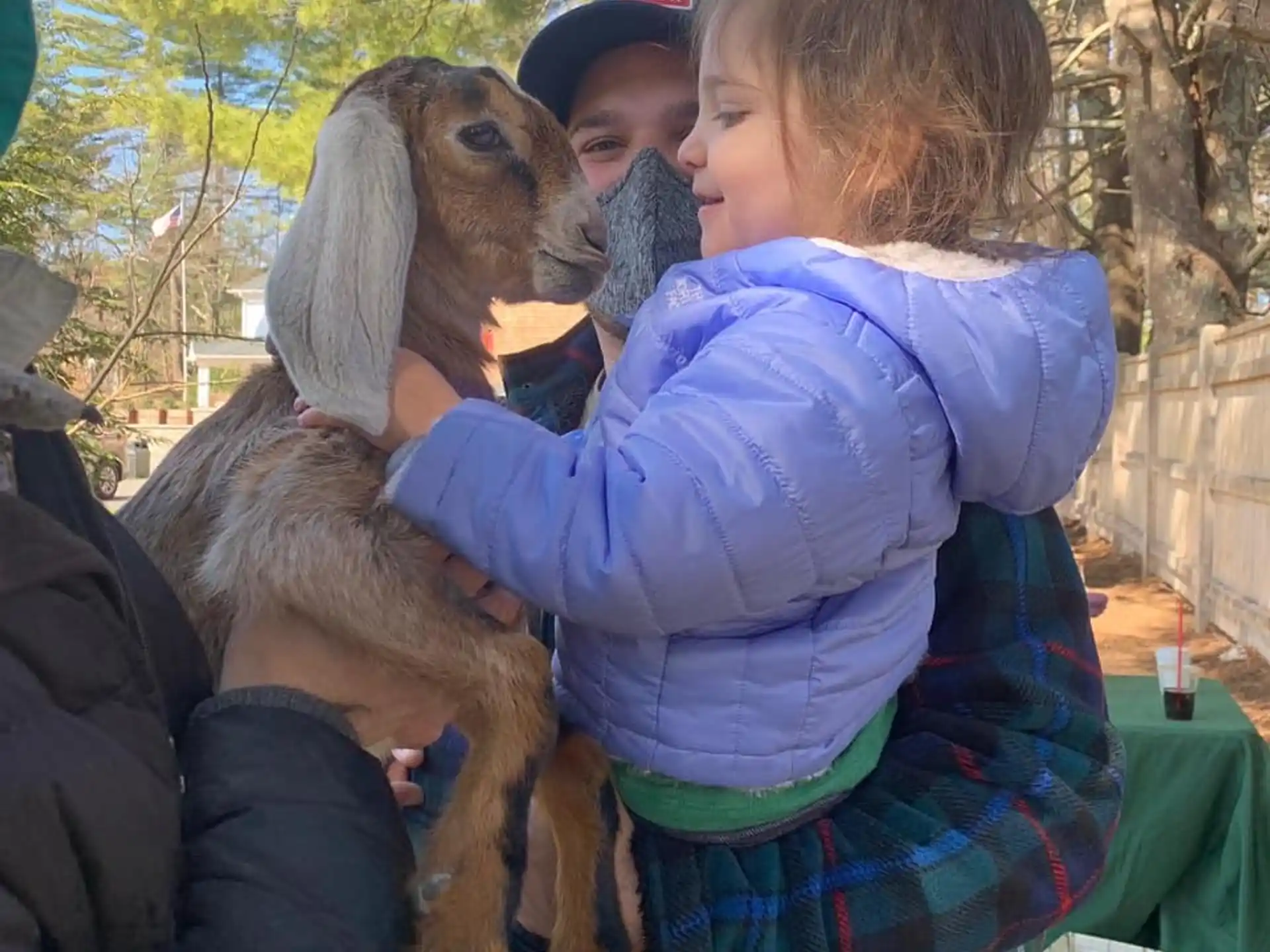 a person holding a baby