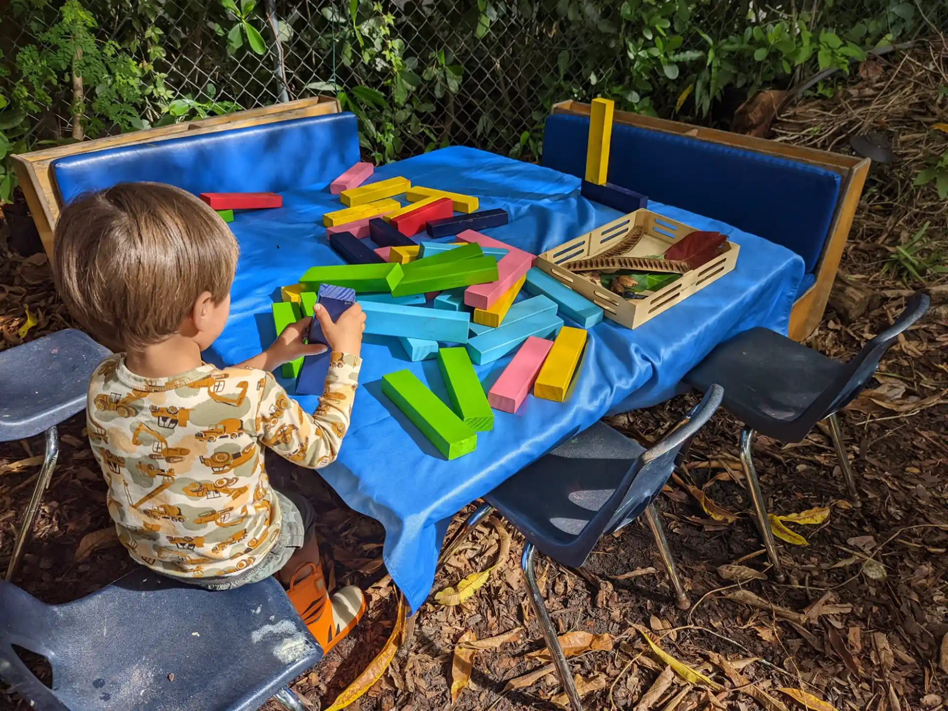 a child painting on a table