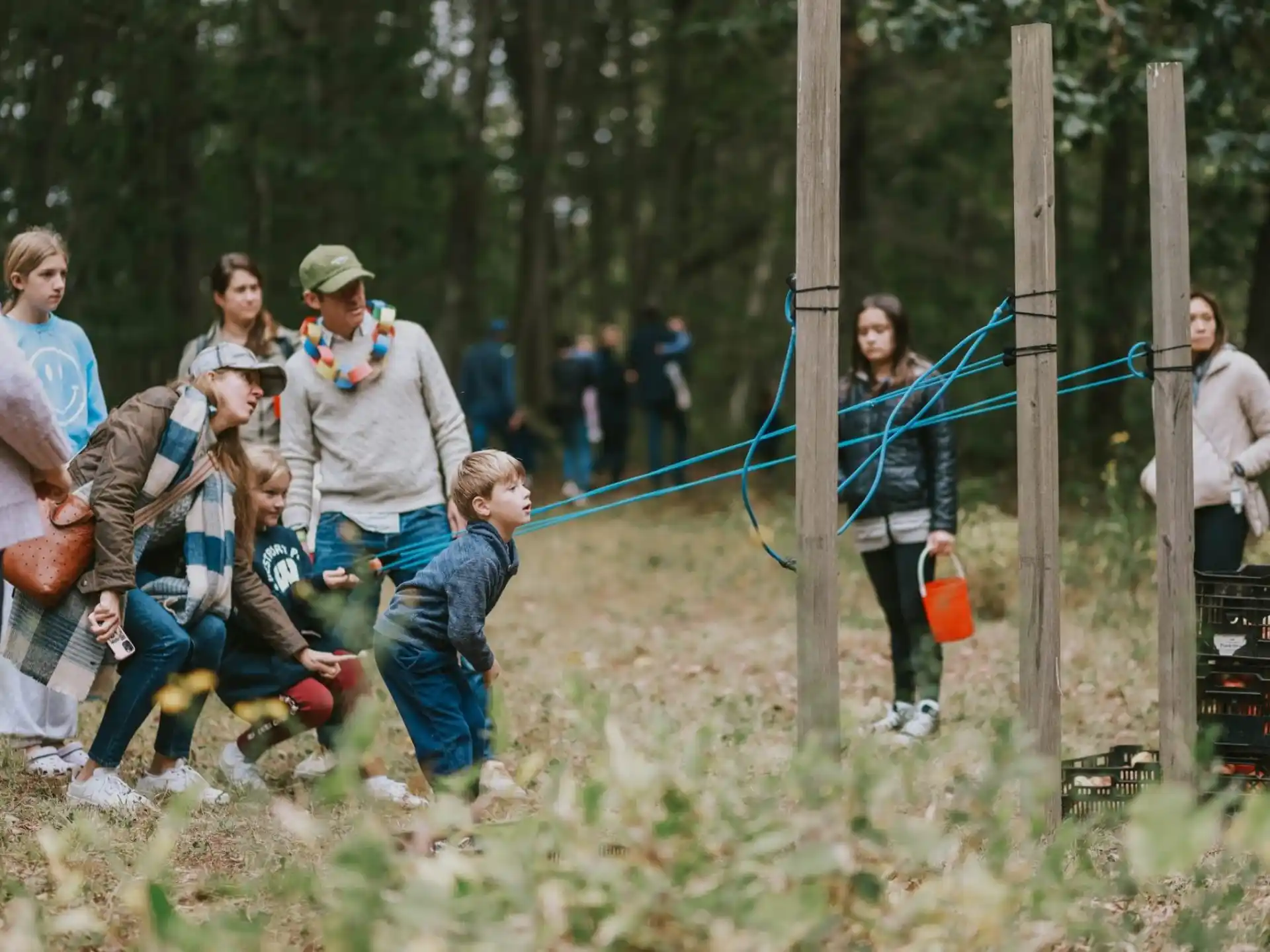 a group of people in a forest