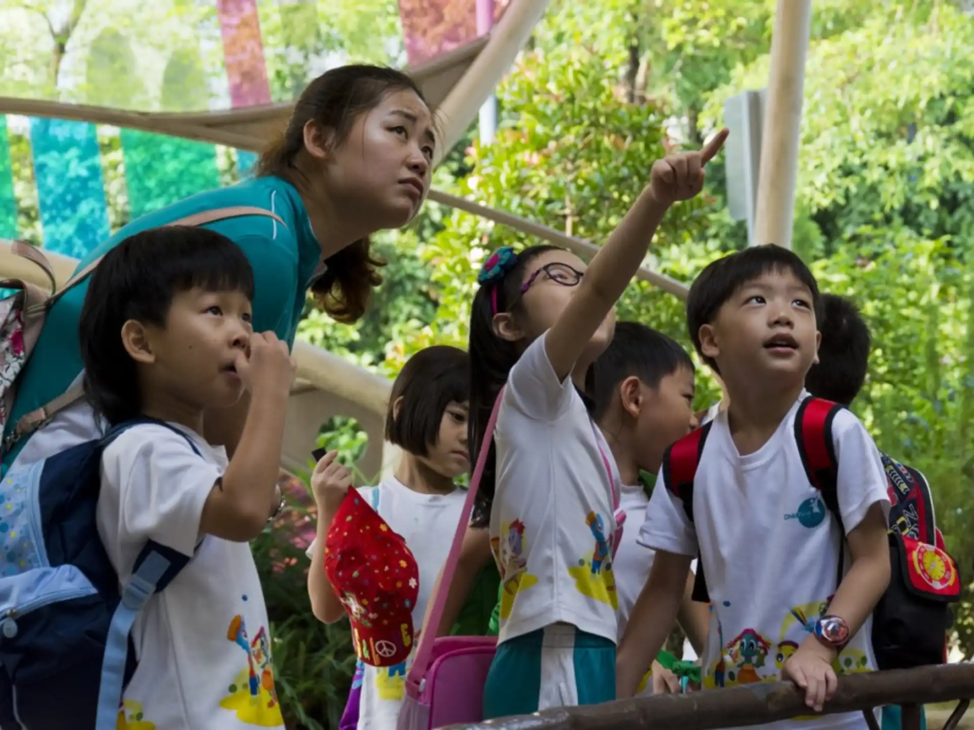 a group of children in school uniforms