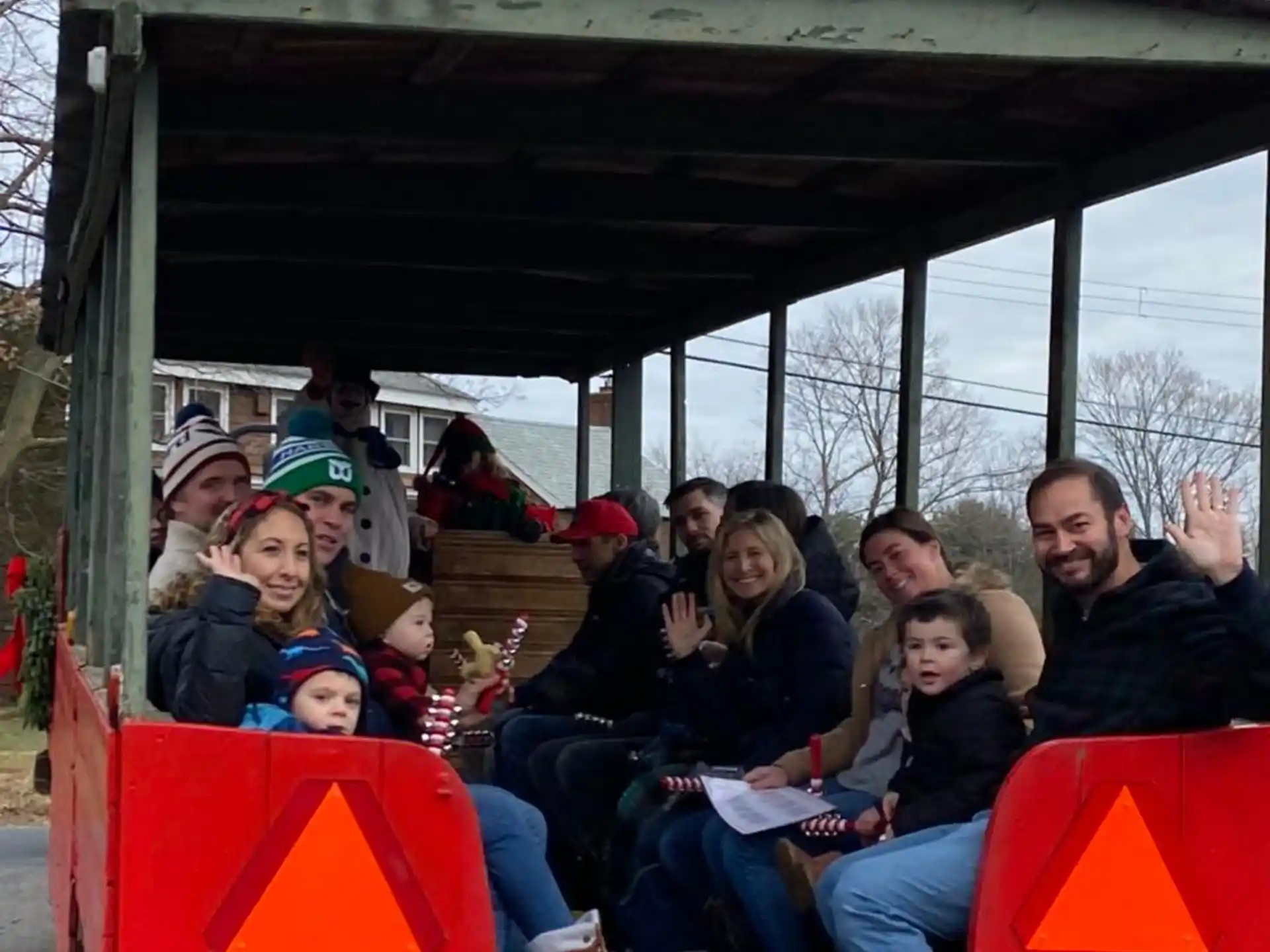 a group of people sitting on a train