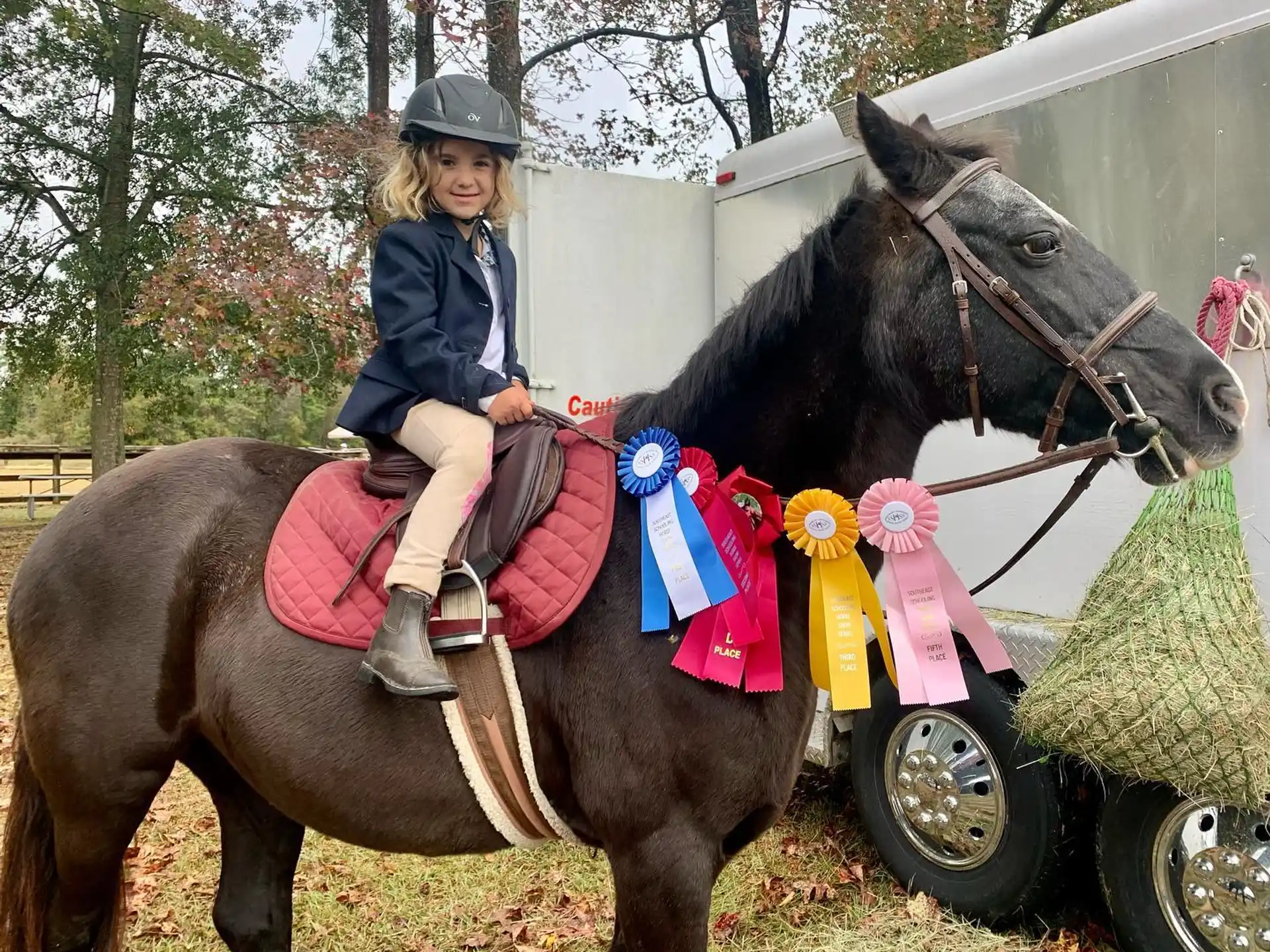 a girl riding a horse