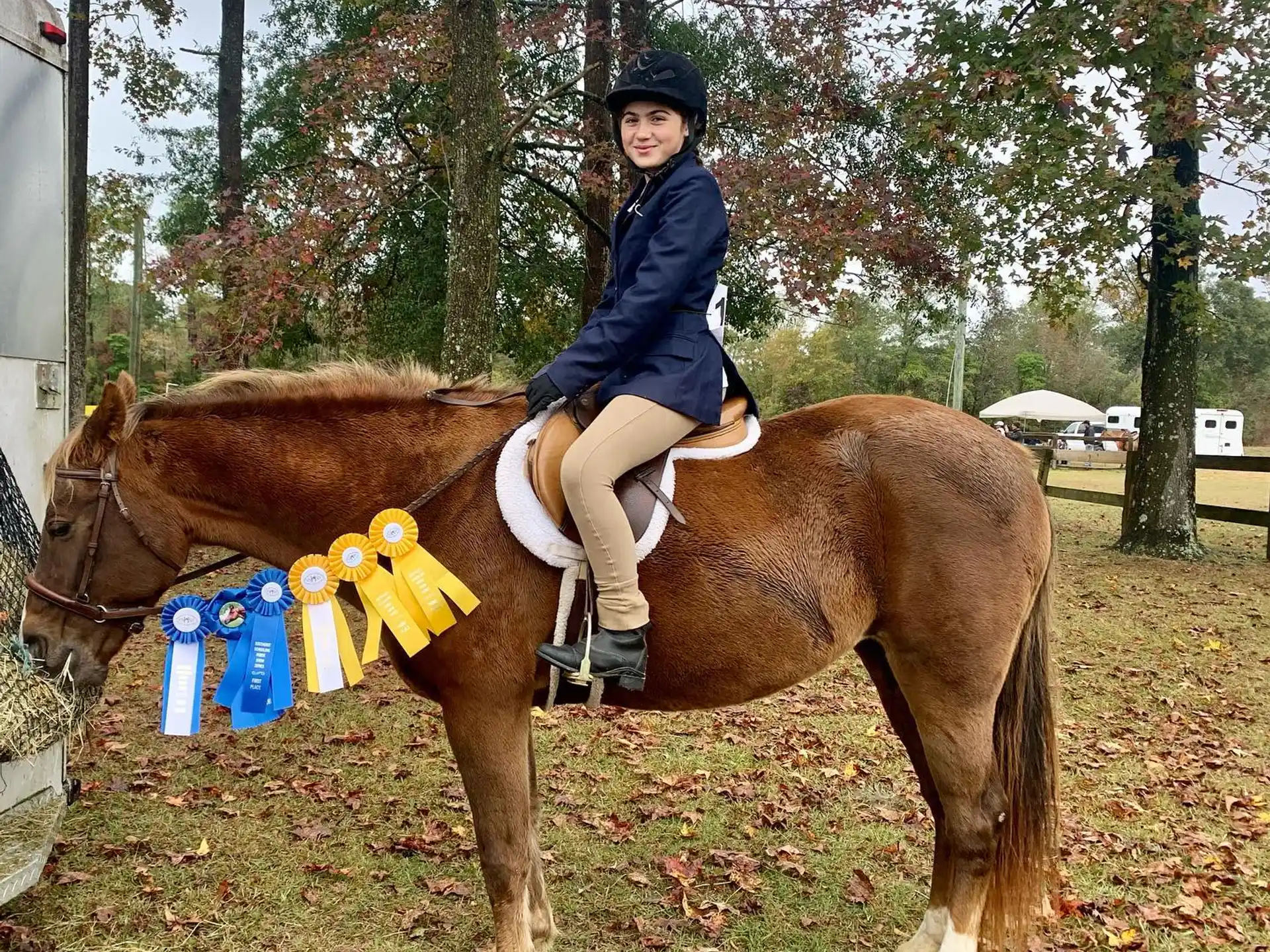 a girl riding a horse