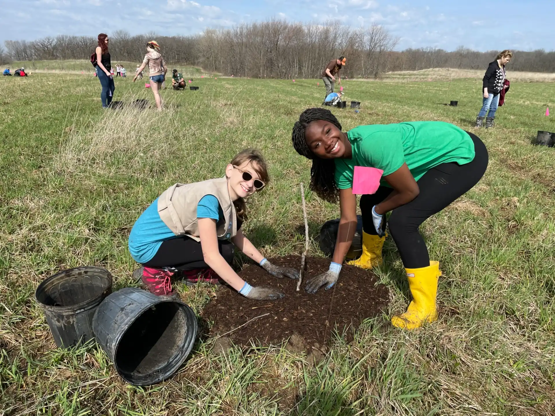 a group of people working in a field