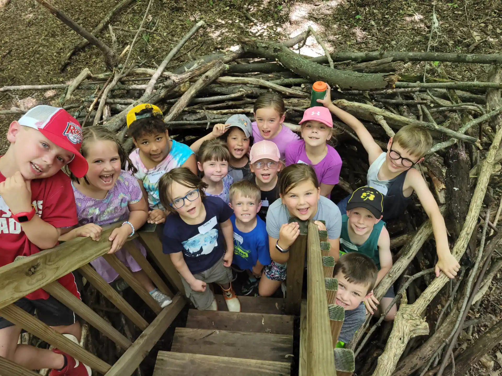 a group of kids posing for a photo