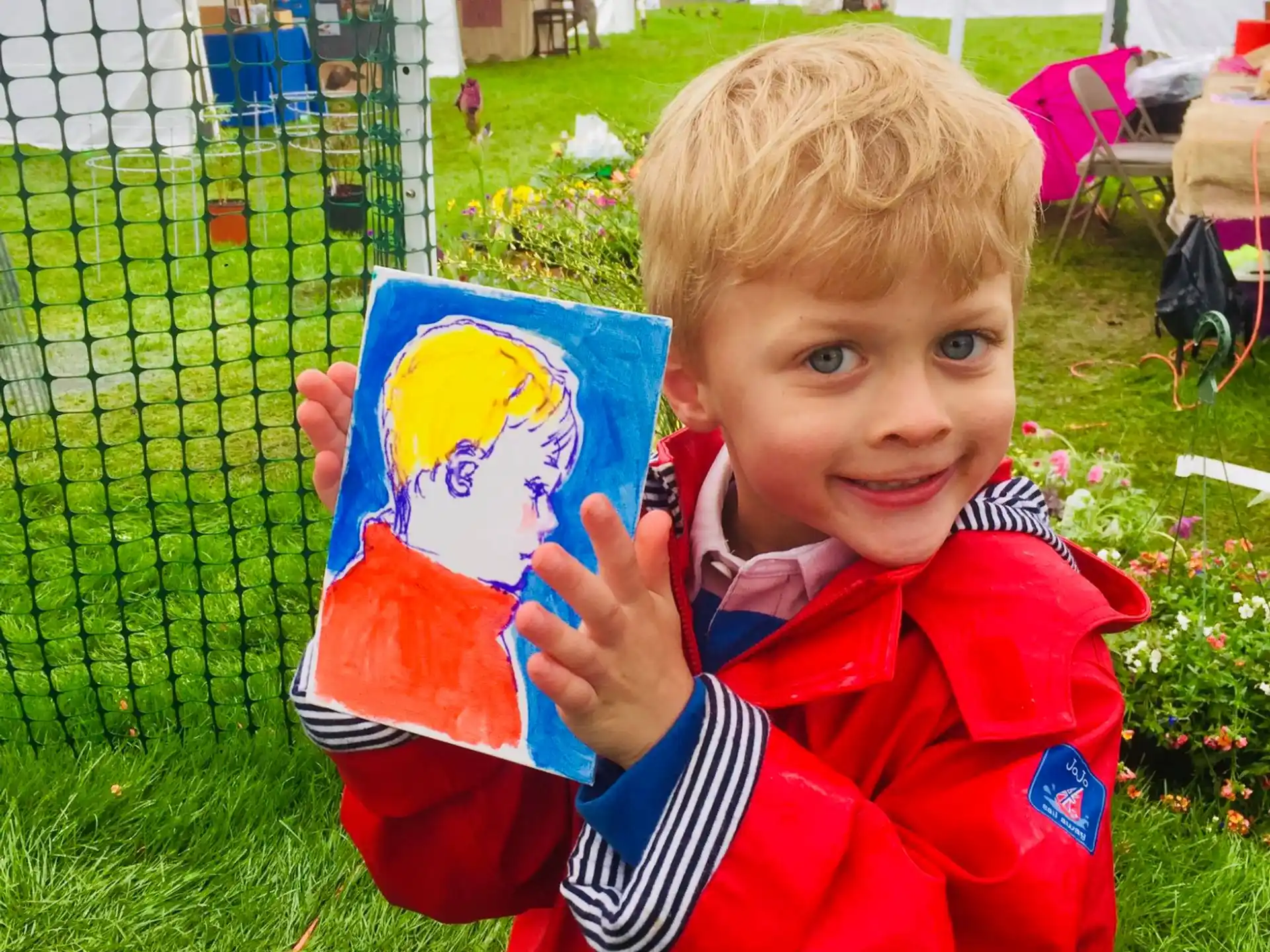 a boy holding a book