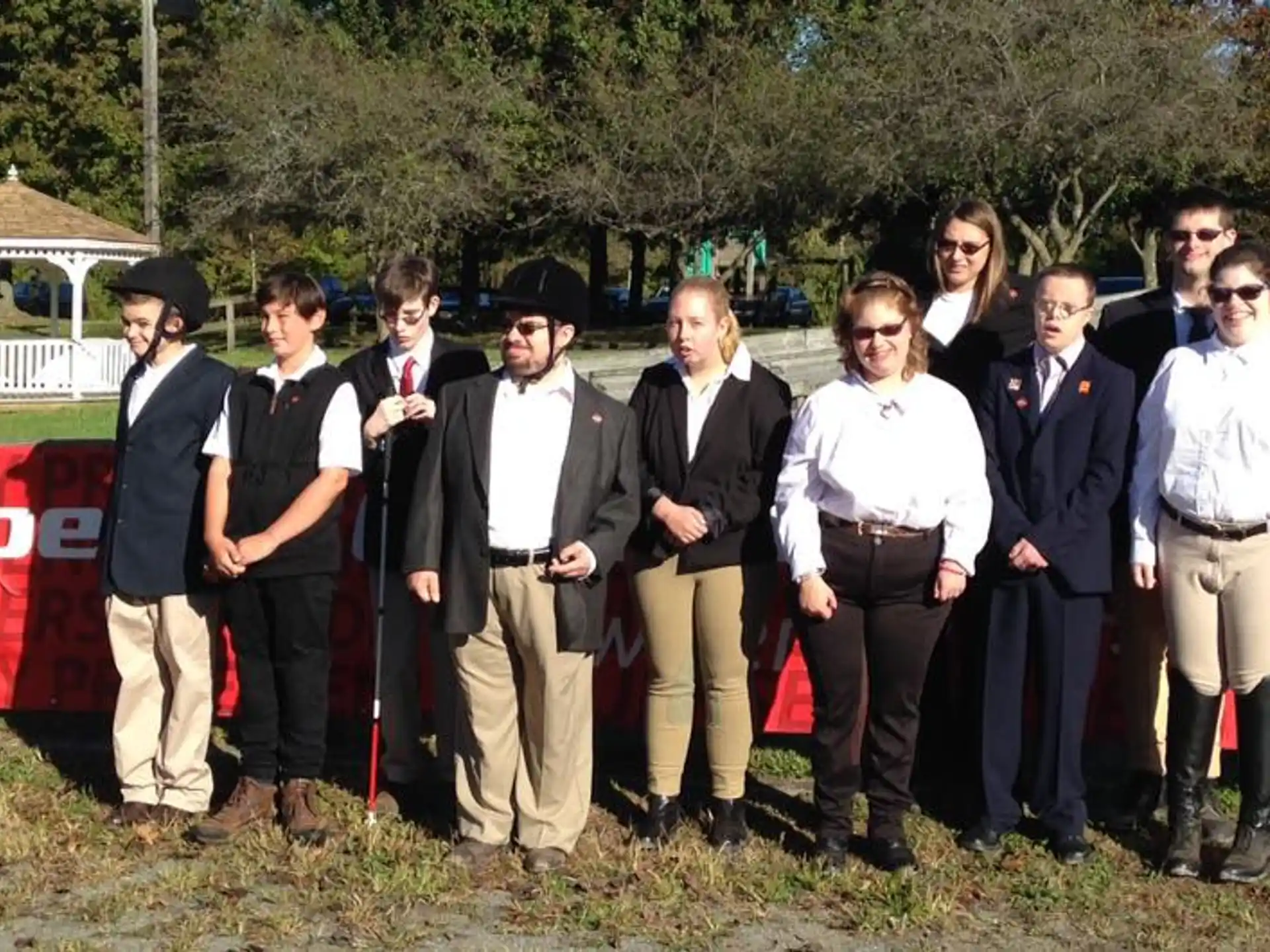 a group of people posing for a photo