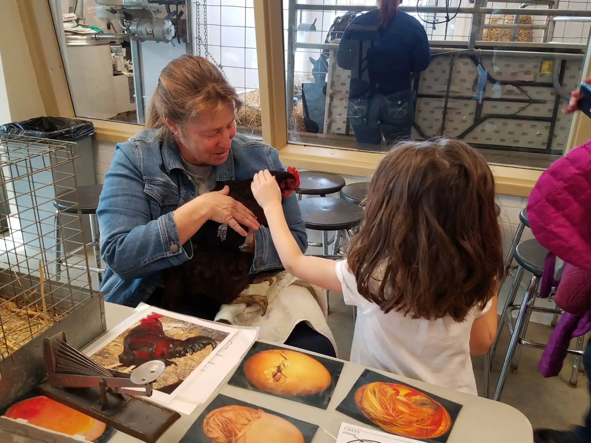 a person and a child at a table with food