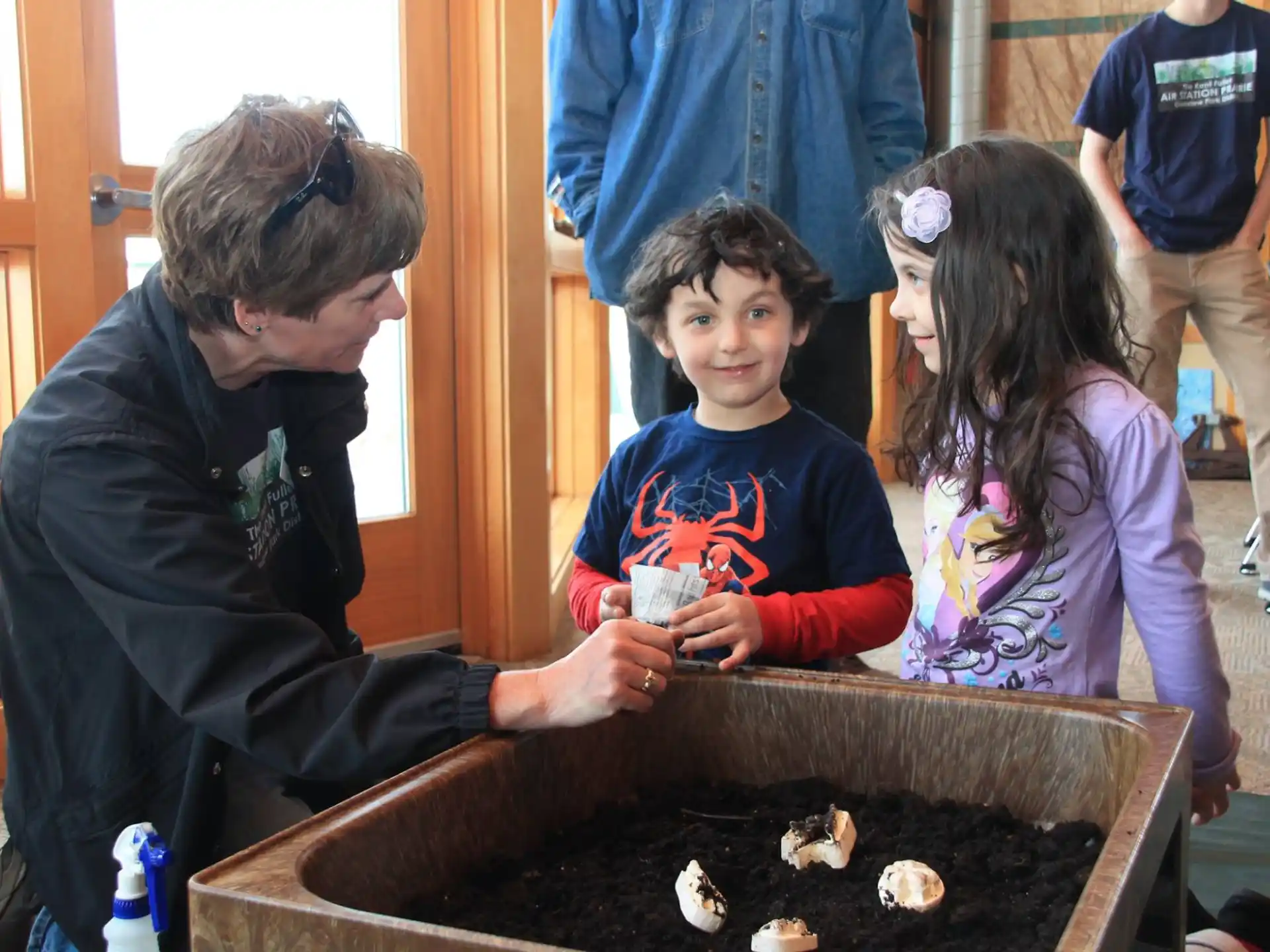 a person and a couple of children