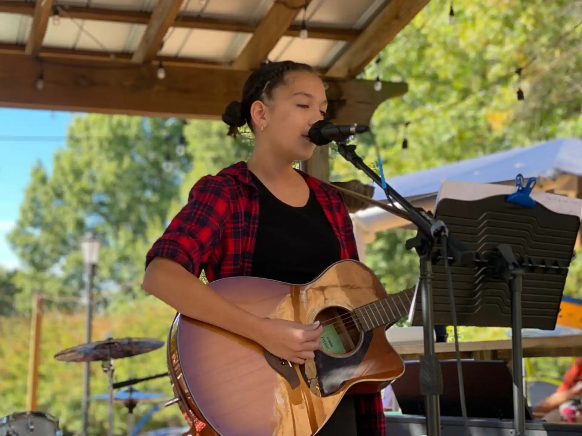 a person playing a guitar