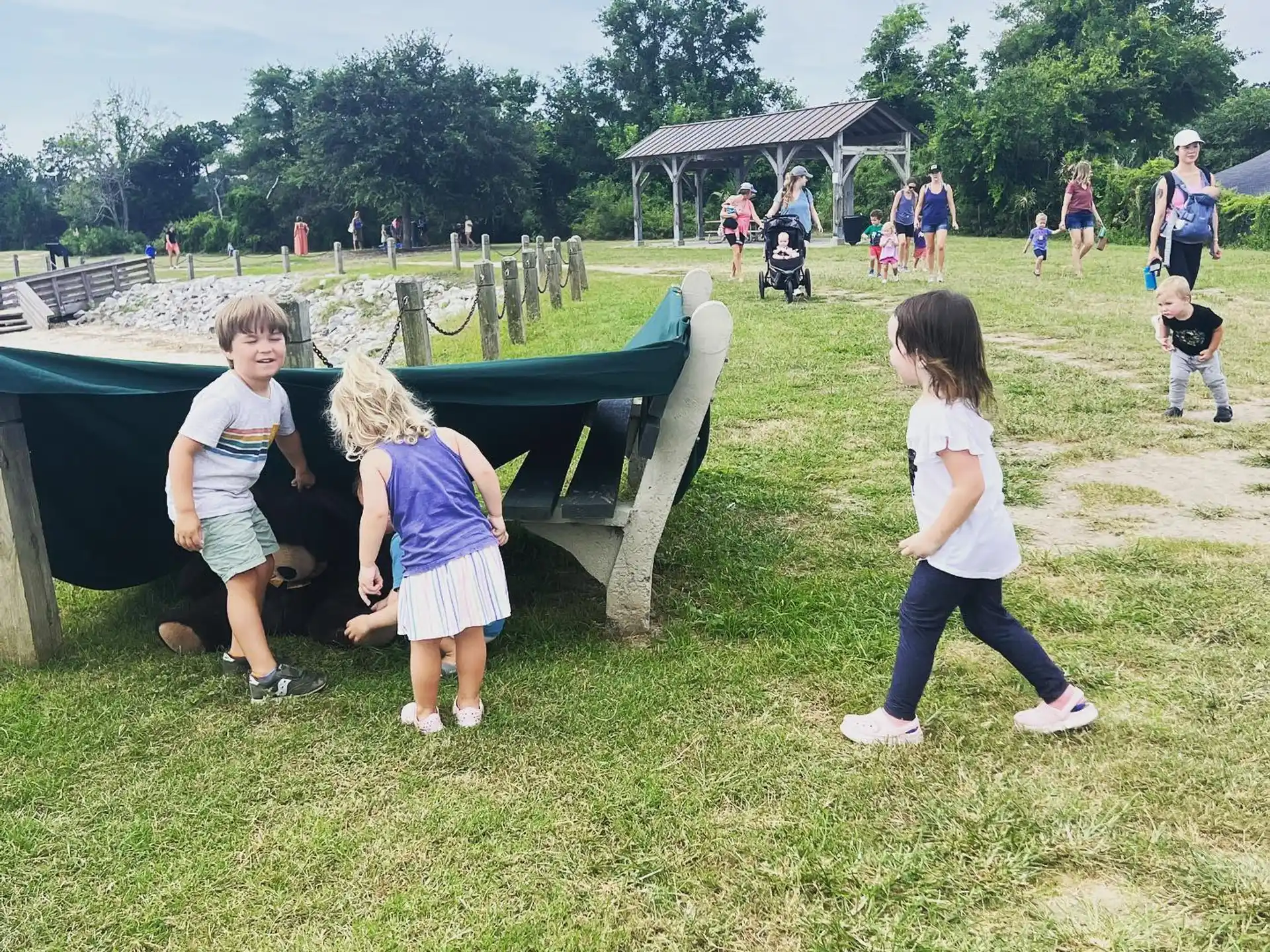 a group of children playing in a park