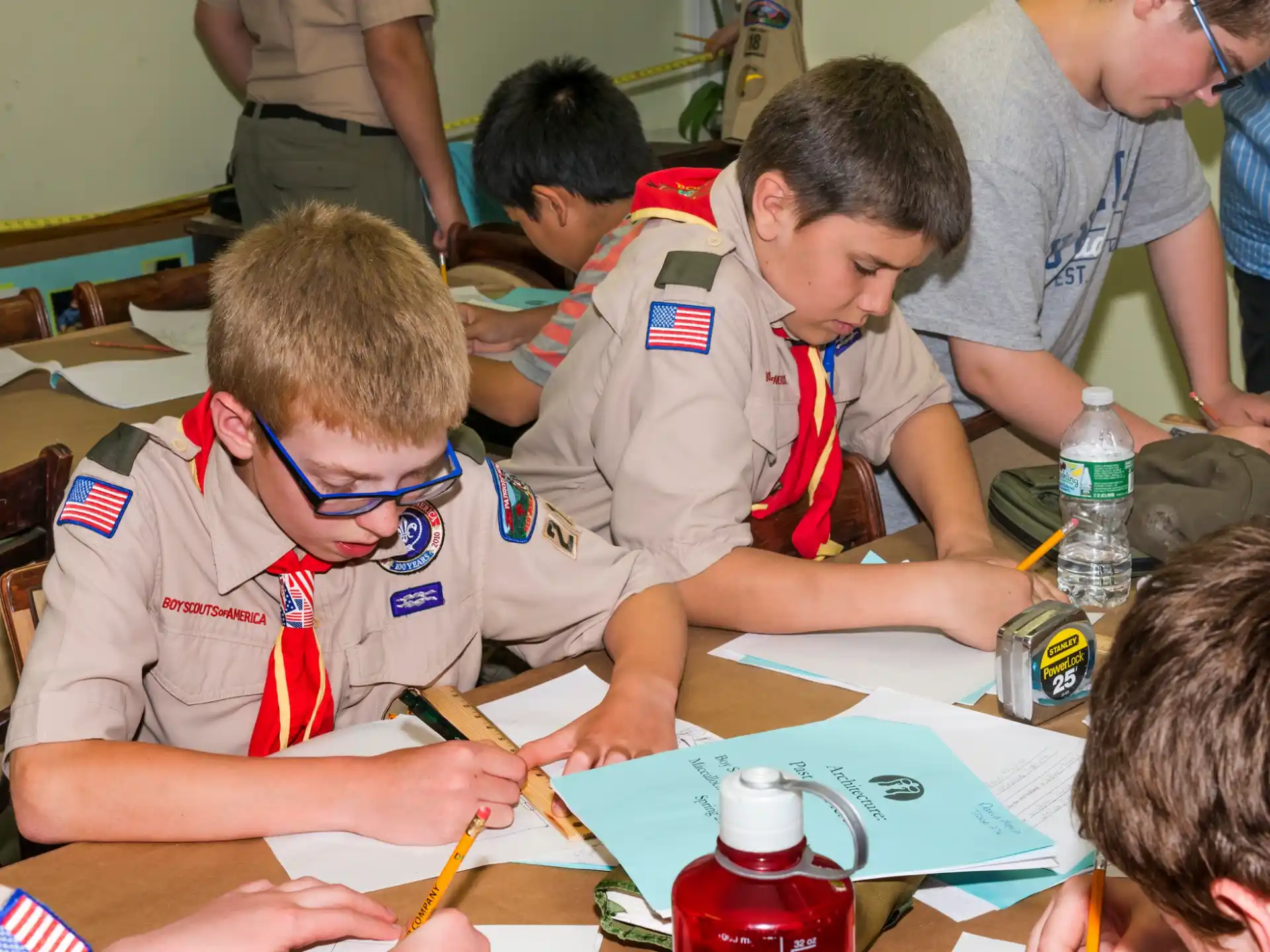a group of boys playing a board game