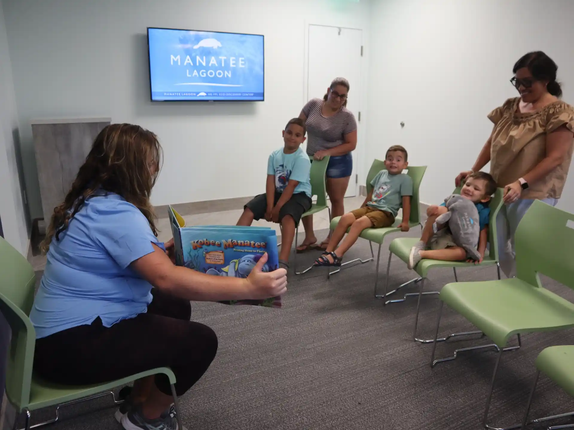 a group of people sitting in a room