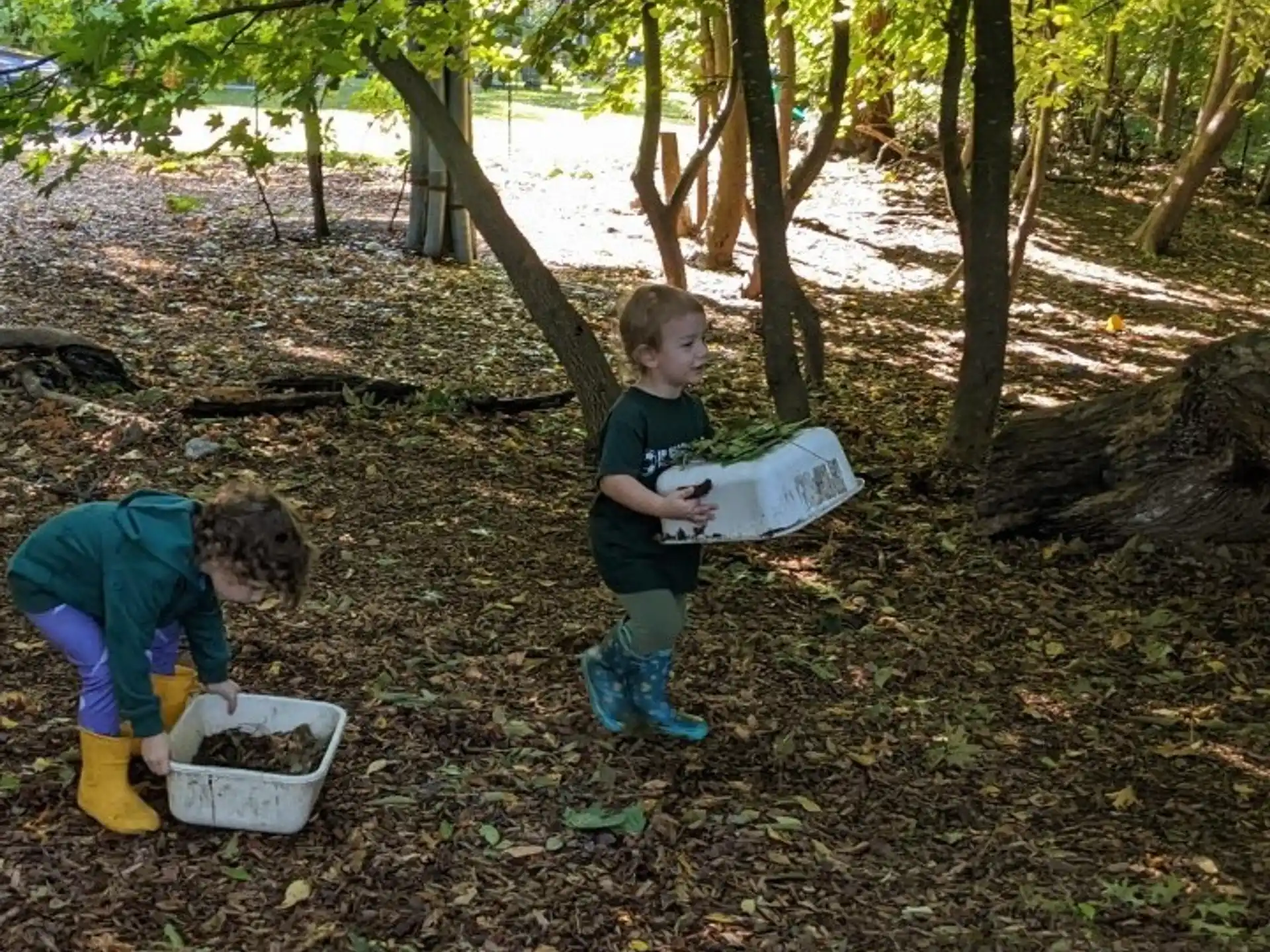 a boy and a girl in the woods