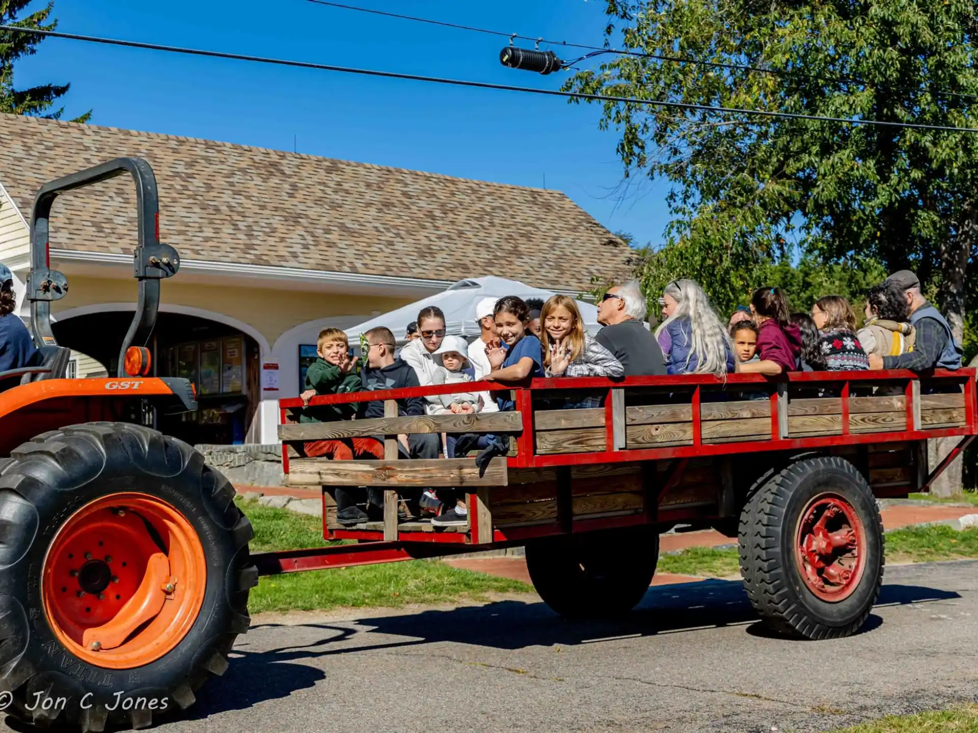 a group of people on a tractor
