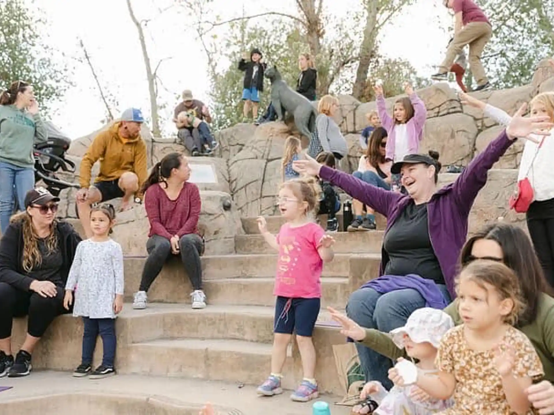 a group of people sitting on steps