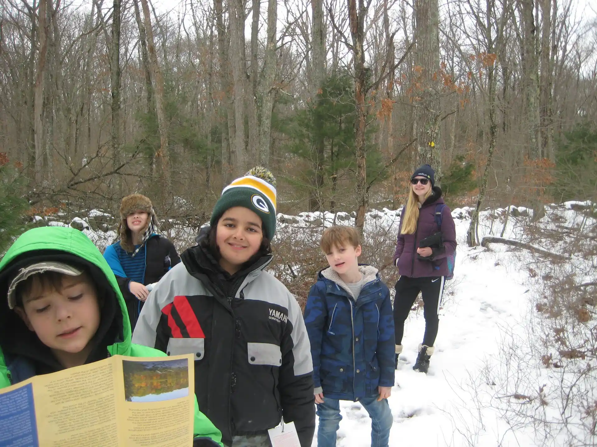 a group of people in the snow