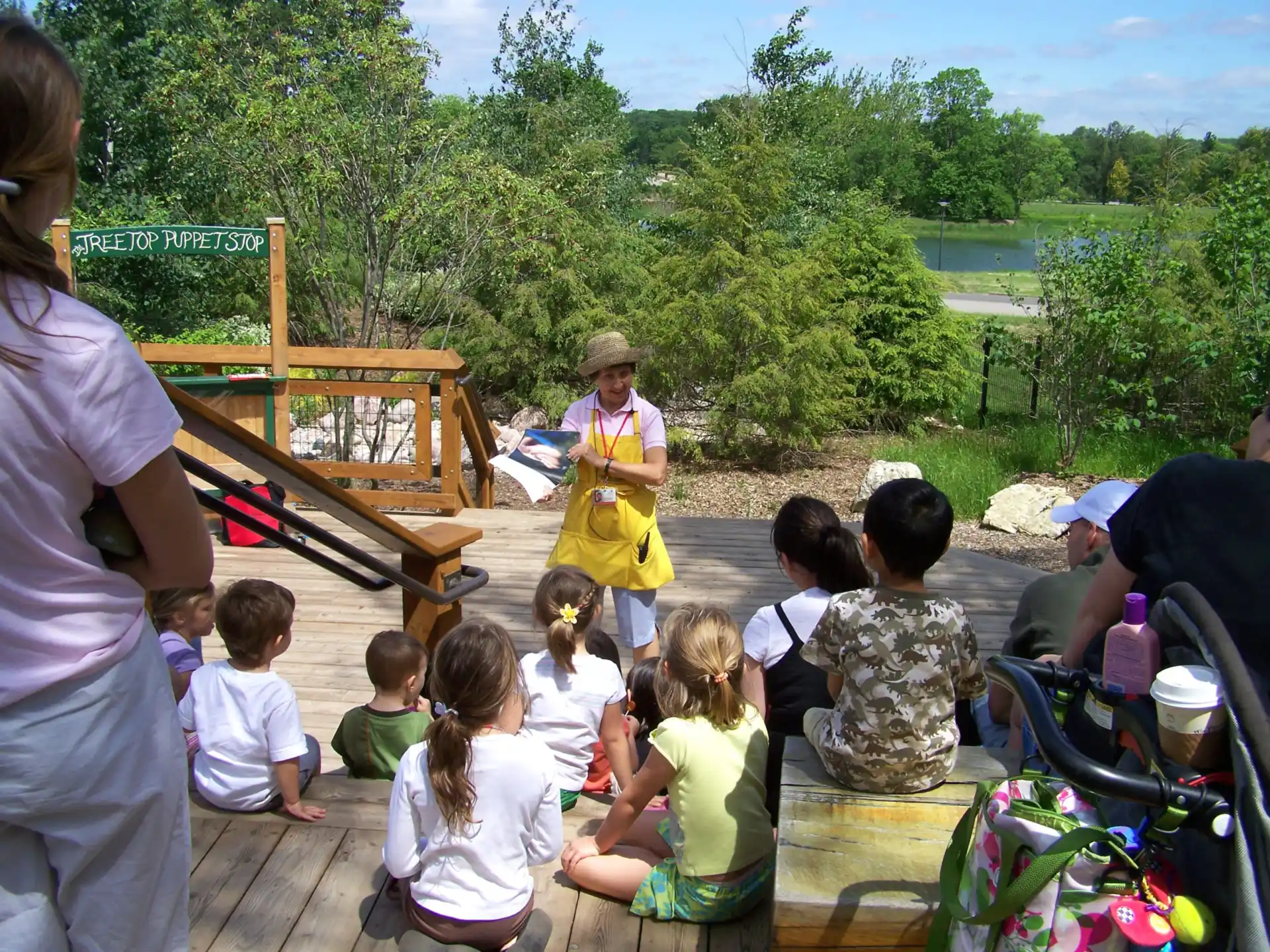 a group of people sitting on a deck