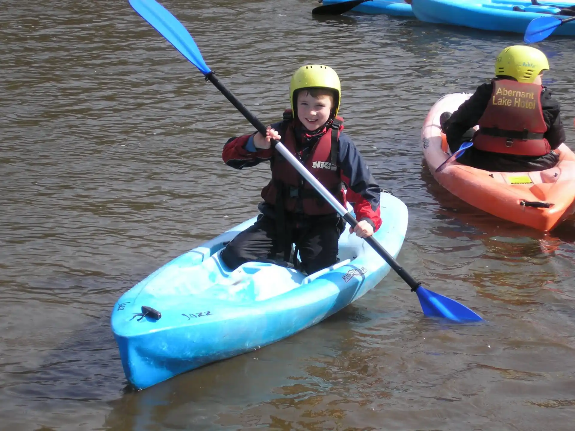 a couple of people in kayaks