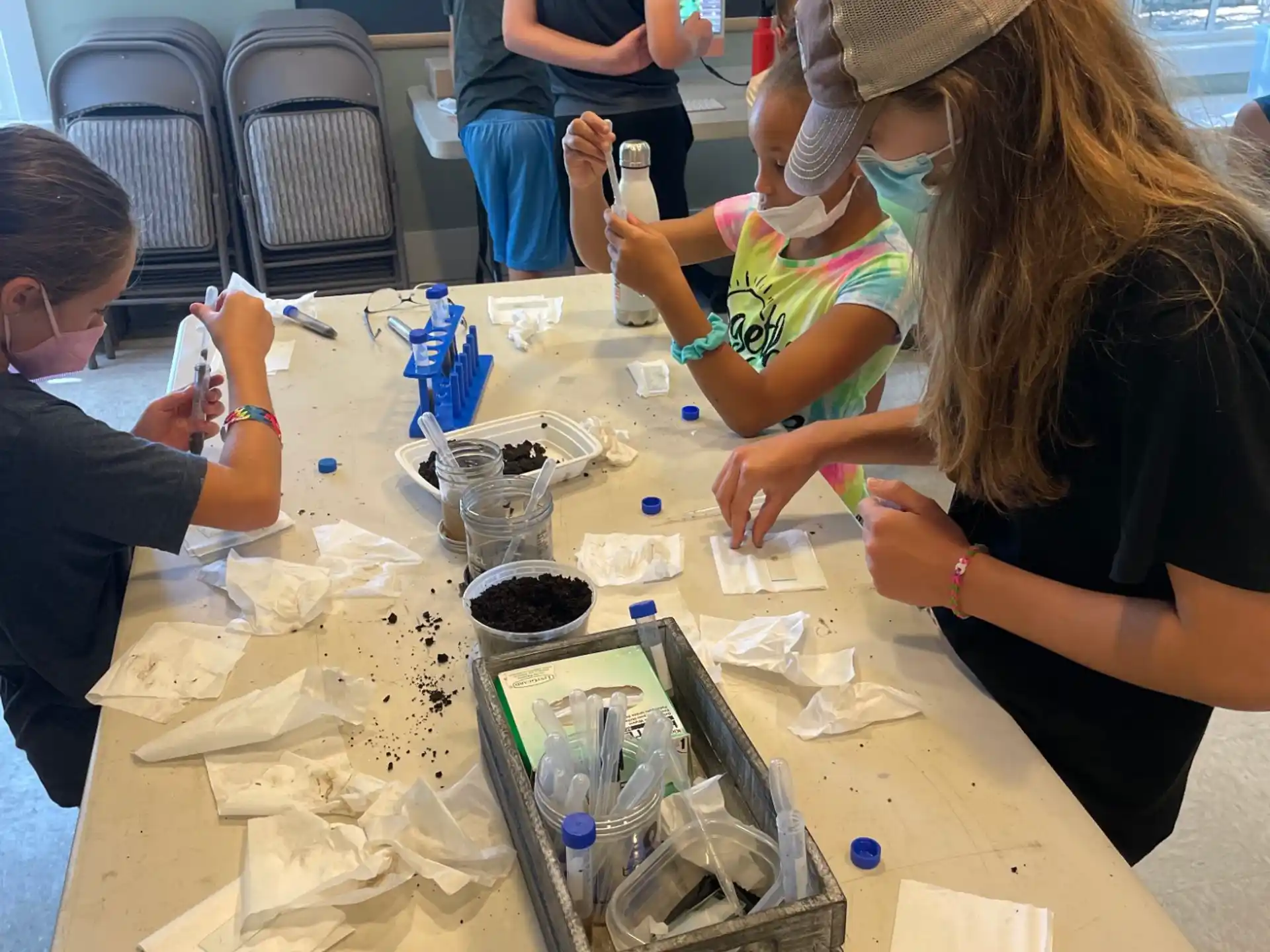 a group of people painting