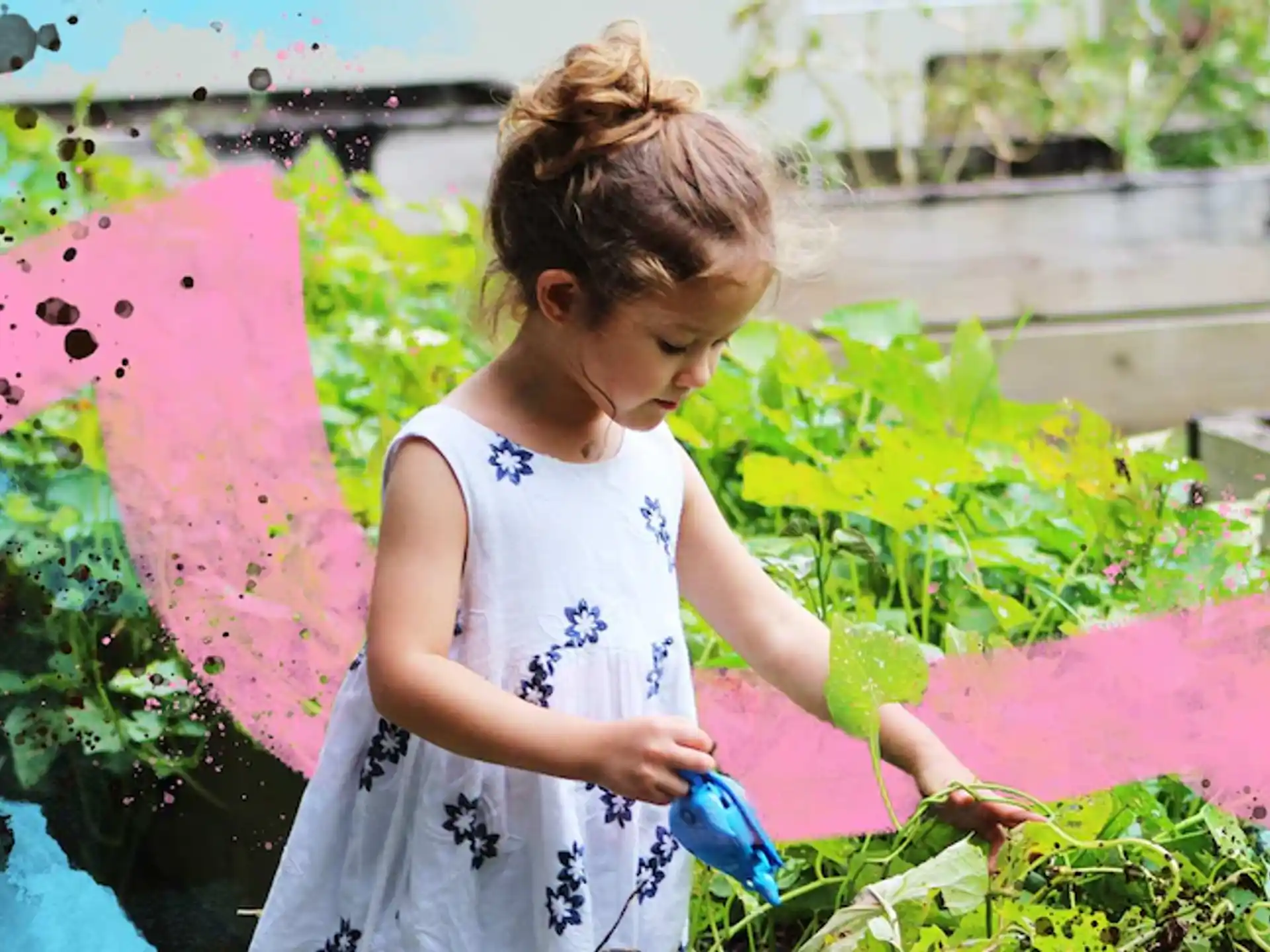 a girl watering plants