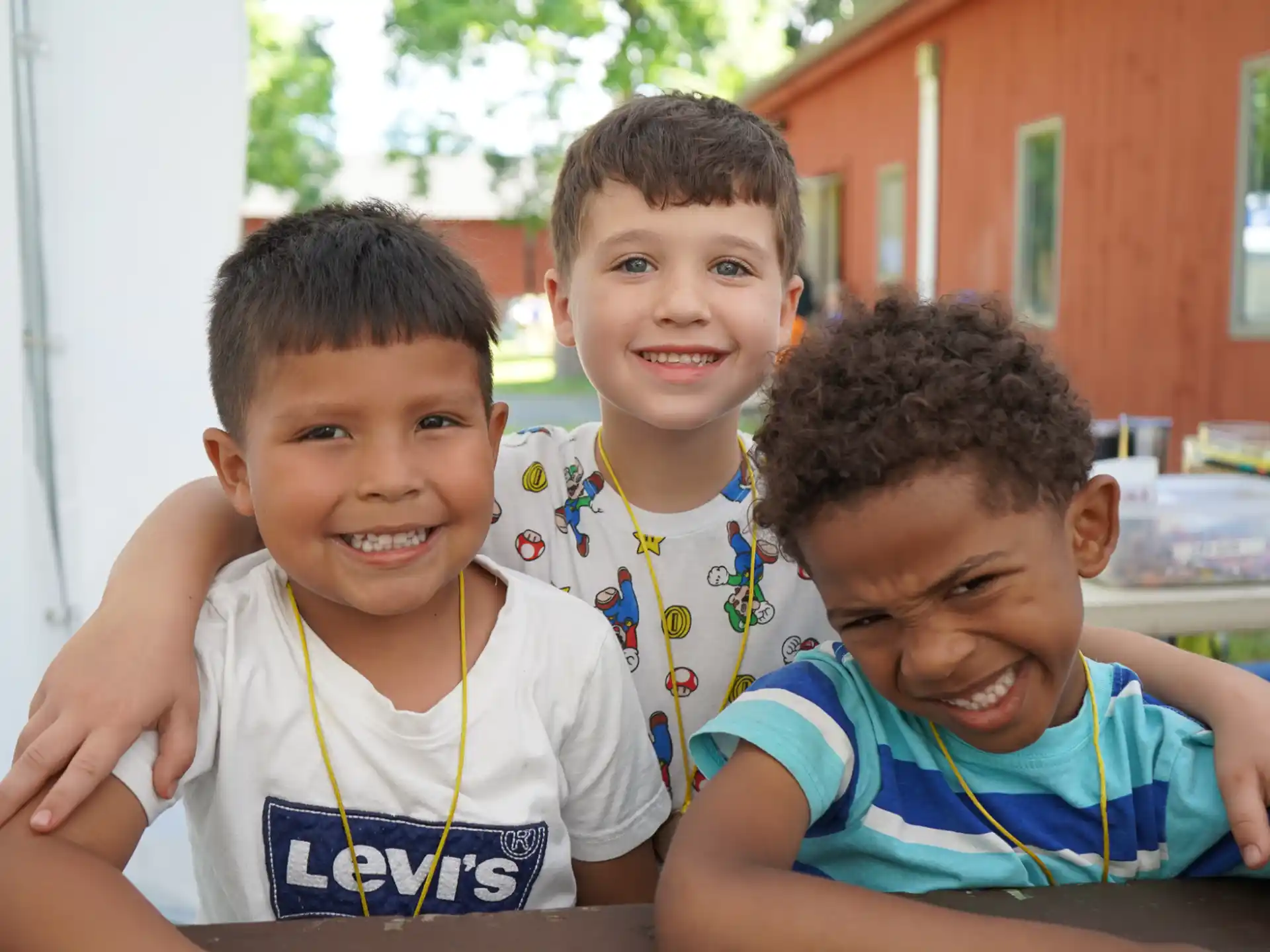 a group of boys smiling