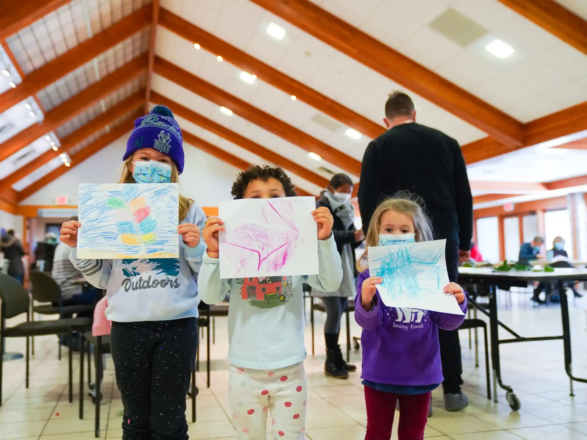 a group of children holding signs