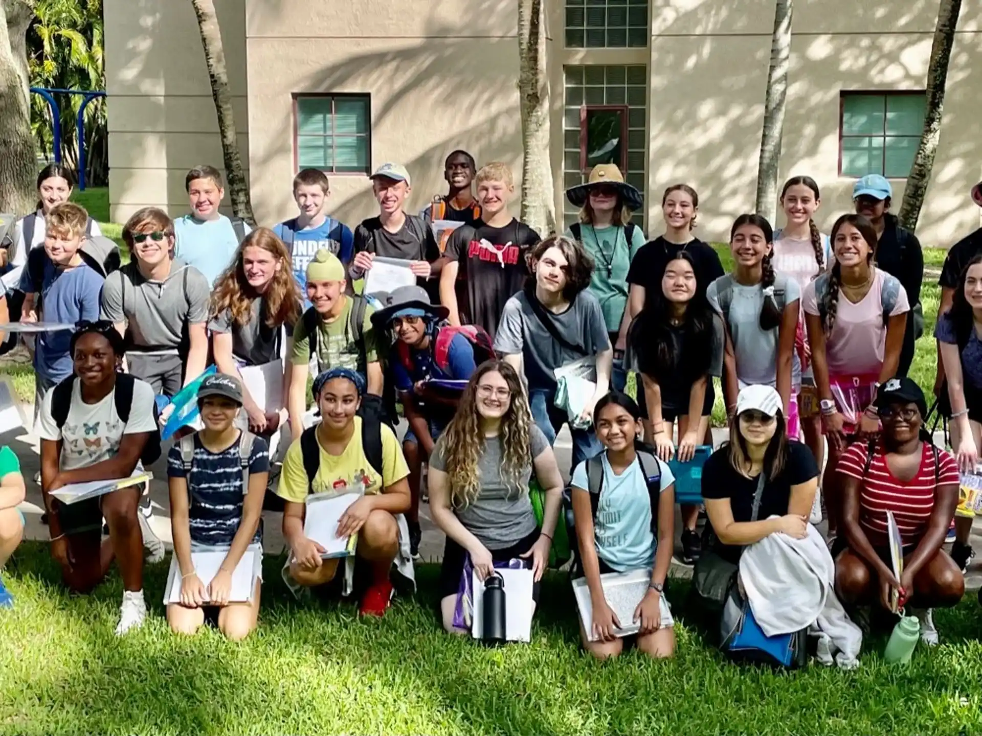 a group of people posing for a photo