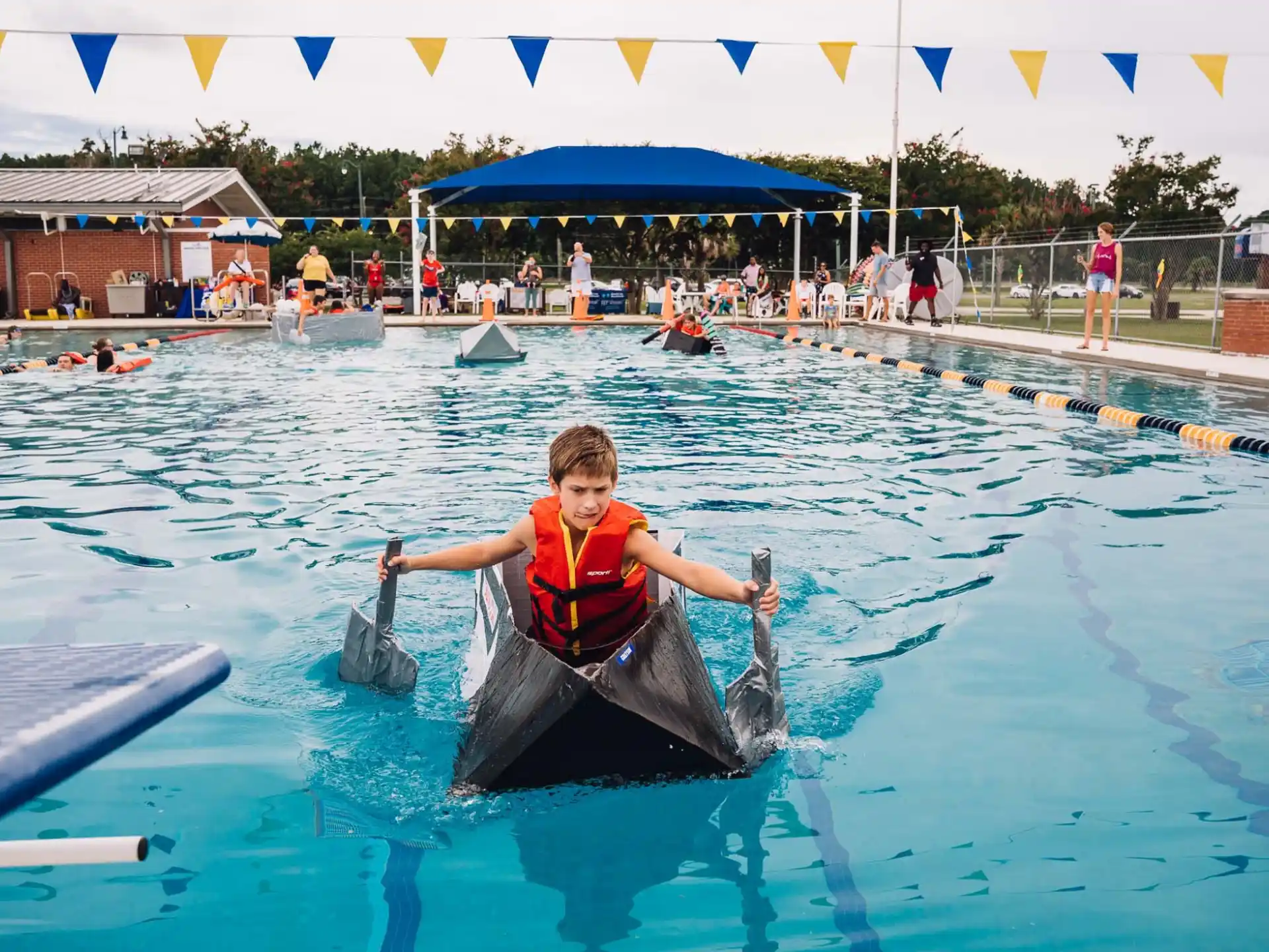 a boy in a pool