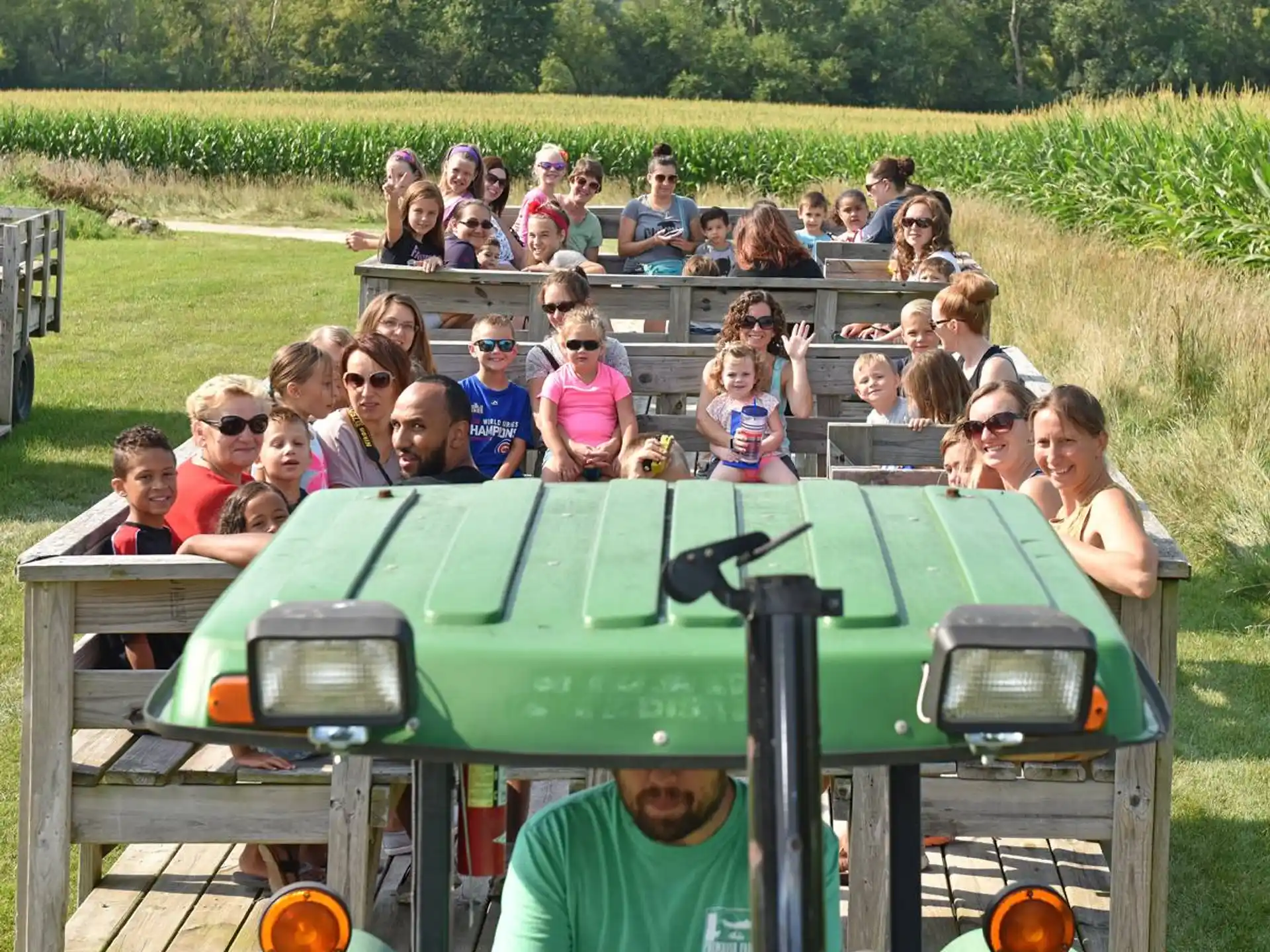 a group of people on a tractor