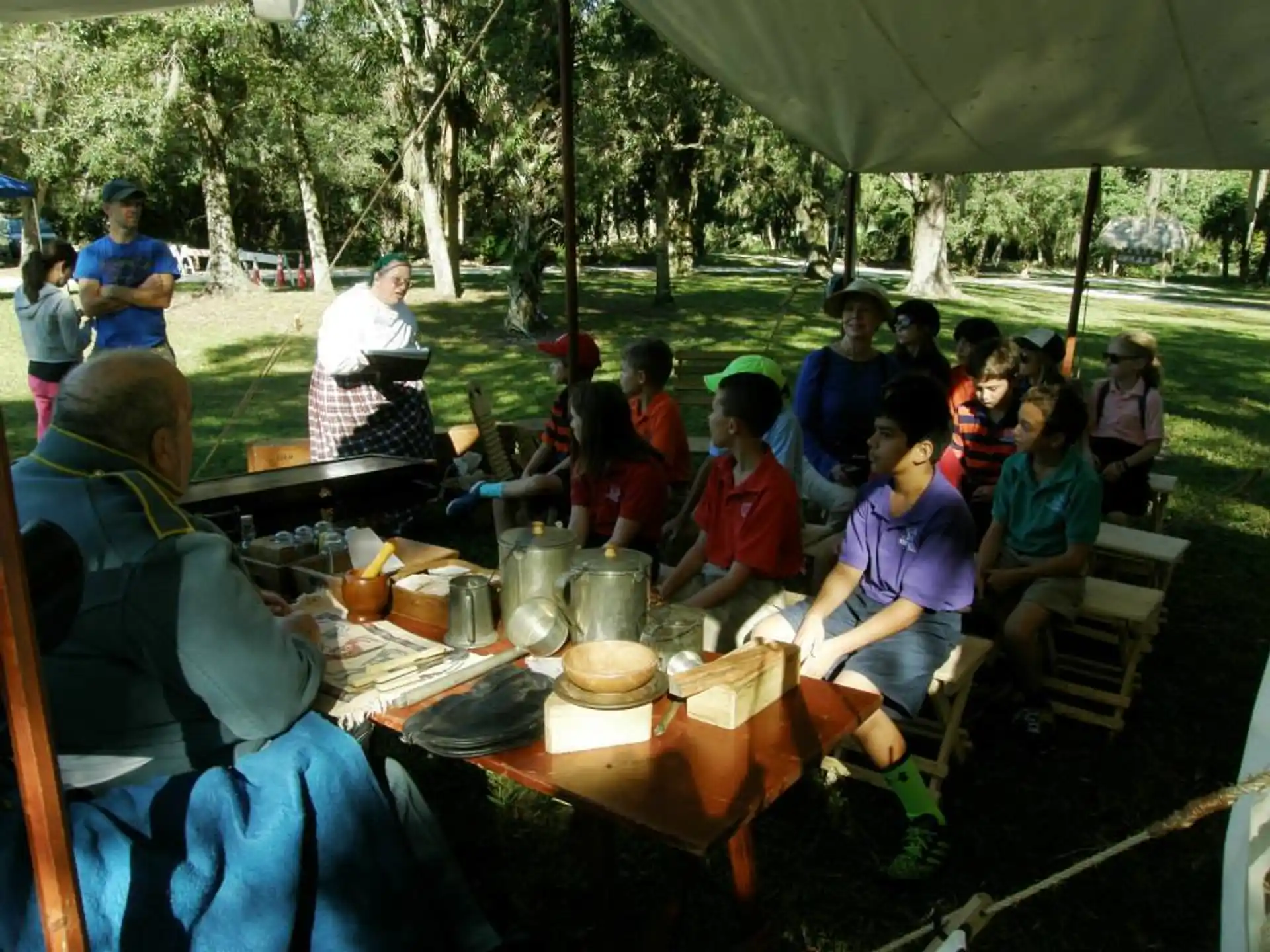 a group of people sitting at a table