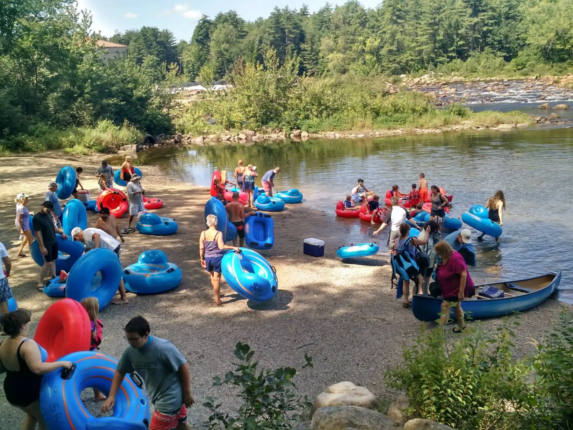 a group of people in a river