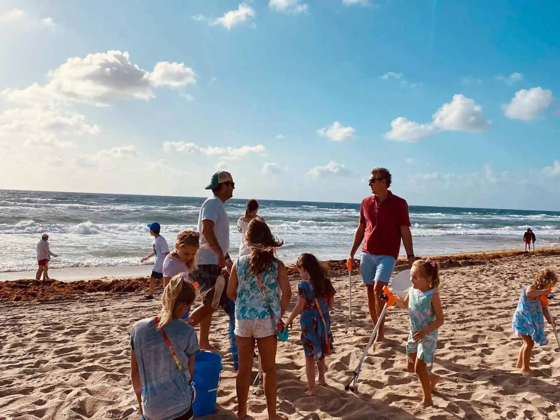 a group of people on a beach